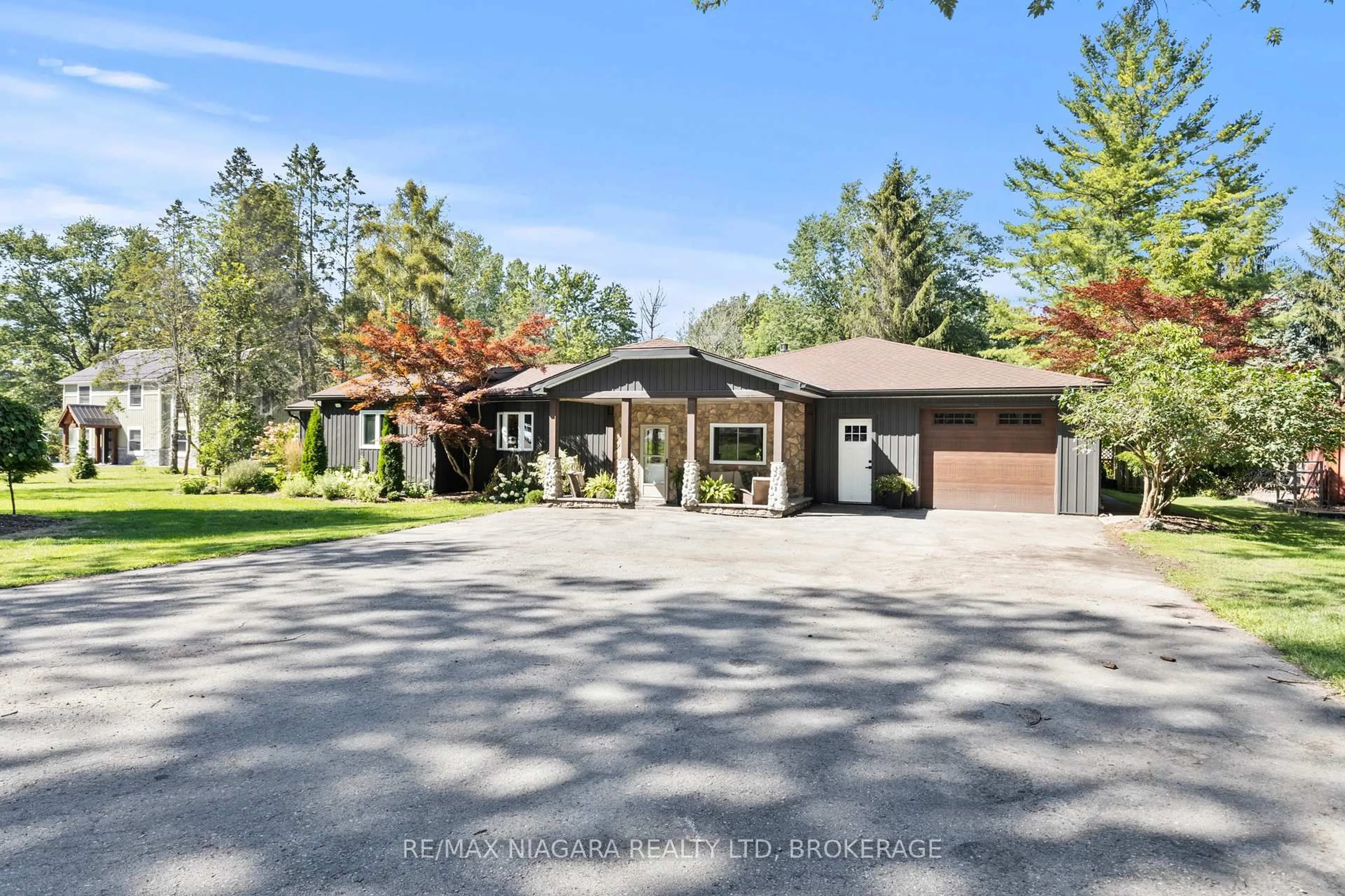 A pic from outside/outdoor area/front of a property/back of a property/a pic from drone, street for 10408 Lakeshore Rd, Wainfleet Ontario L3K 5V4