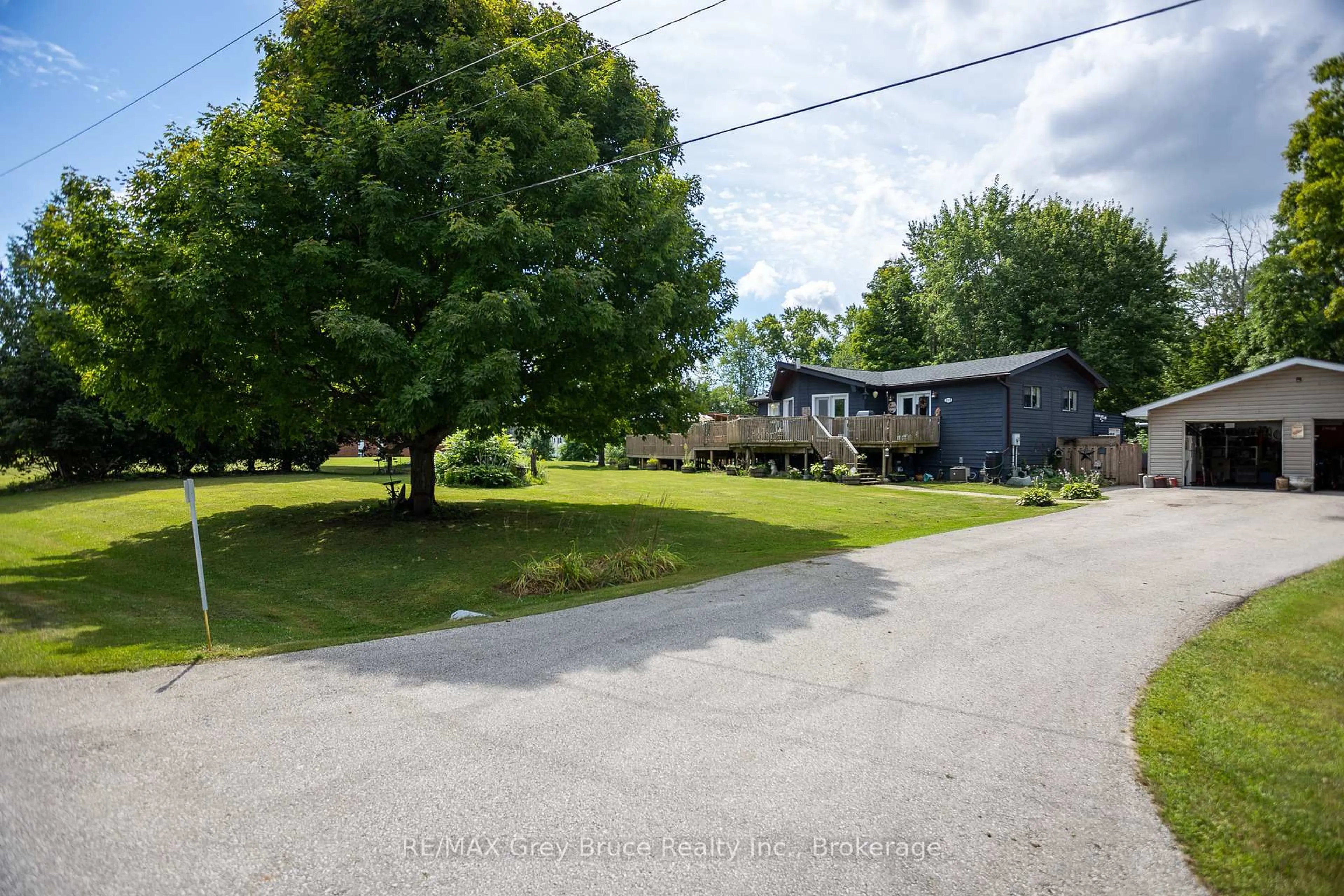 A pic from outside/outdoor area/front of a property/back of a property/a pic from drone, street for 201 DIVISION St, Georgian Bluffs Ontario N0H 2K0