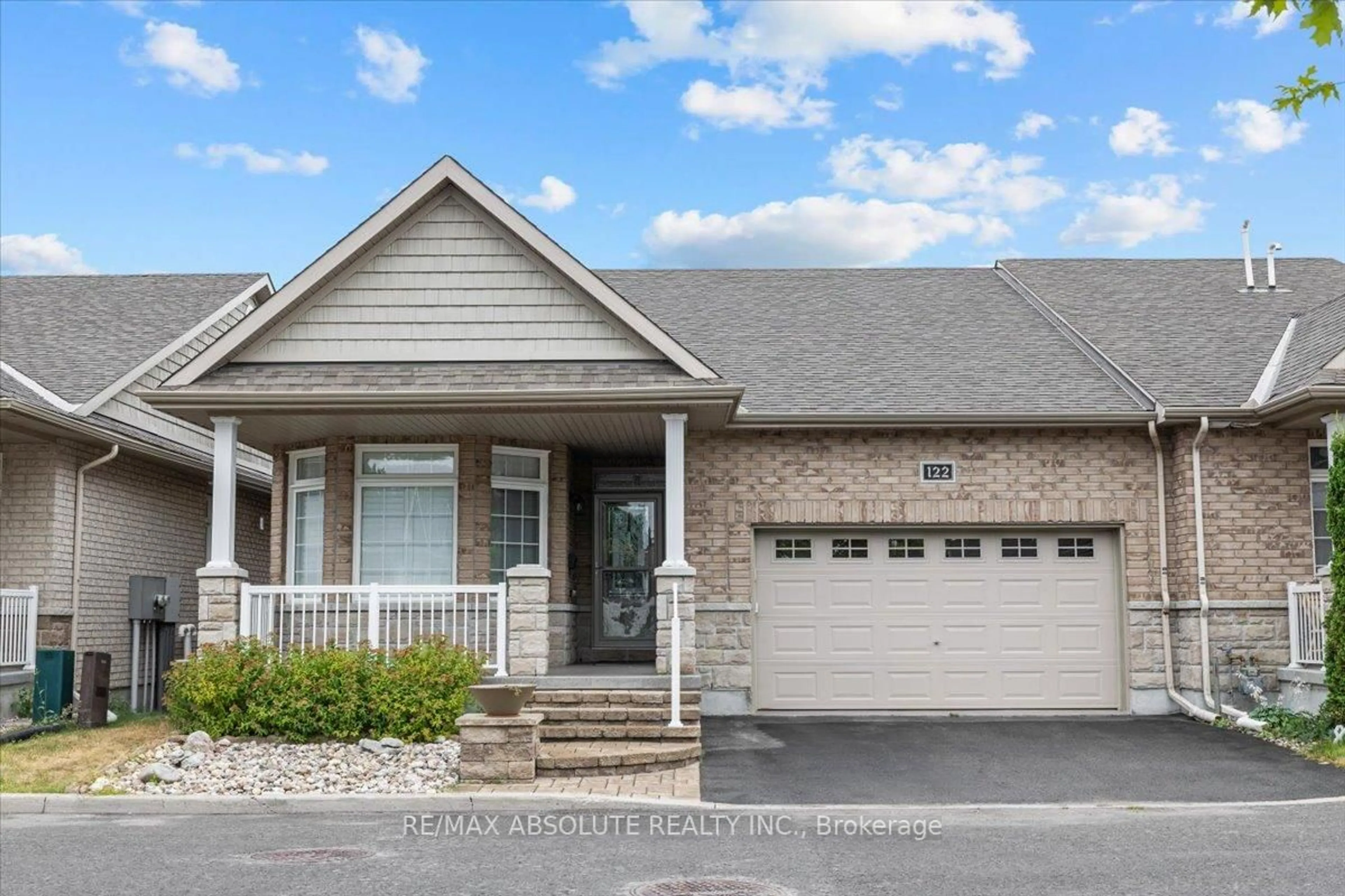 Home with brick exterior material, street for 122 PASSAGEWAY Private, Ottawa Ontario K2M 2B5