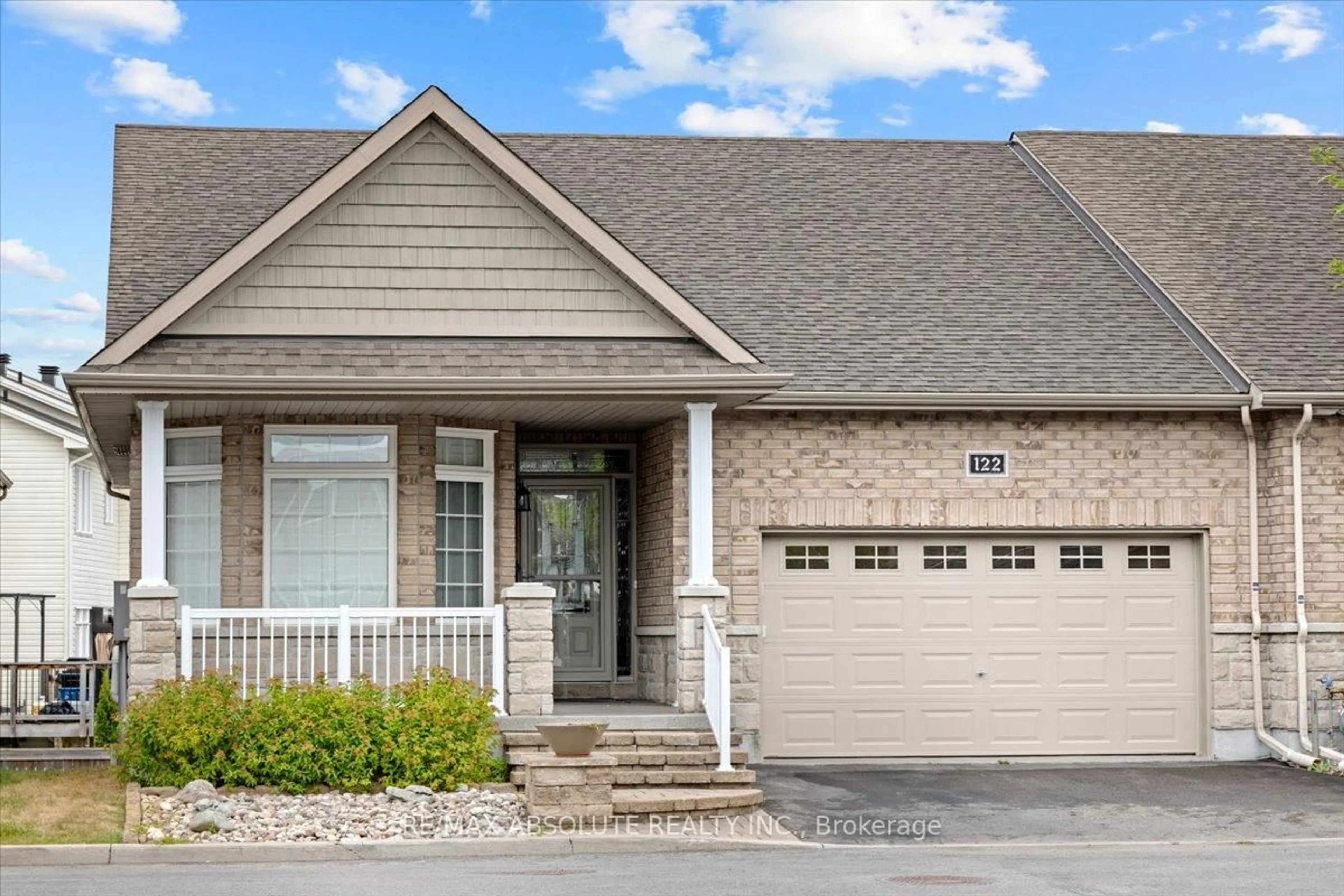 Home with brick exterior material, street for 122 PASSAGEWAY Private, Ottawa Ontario K2M 2B5
