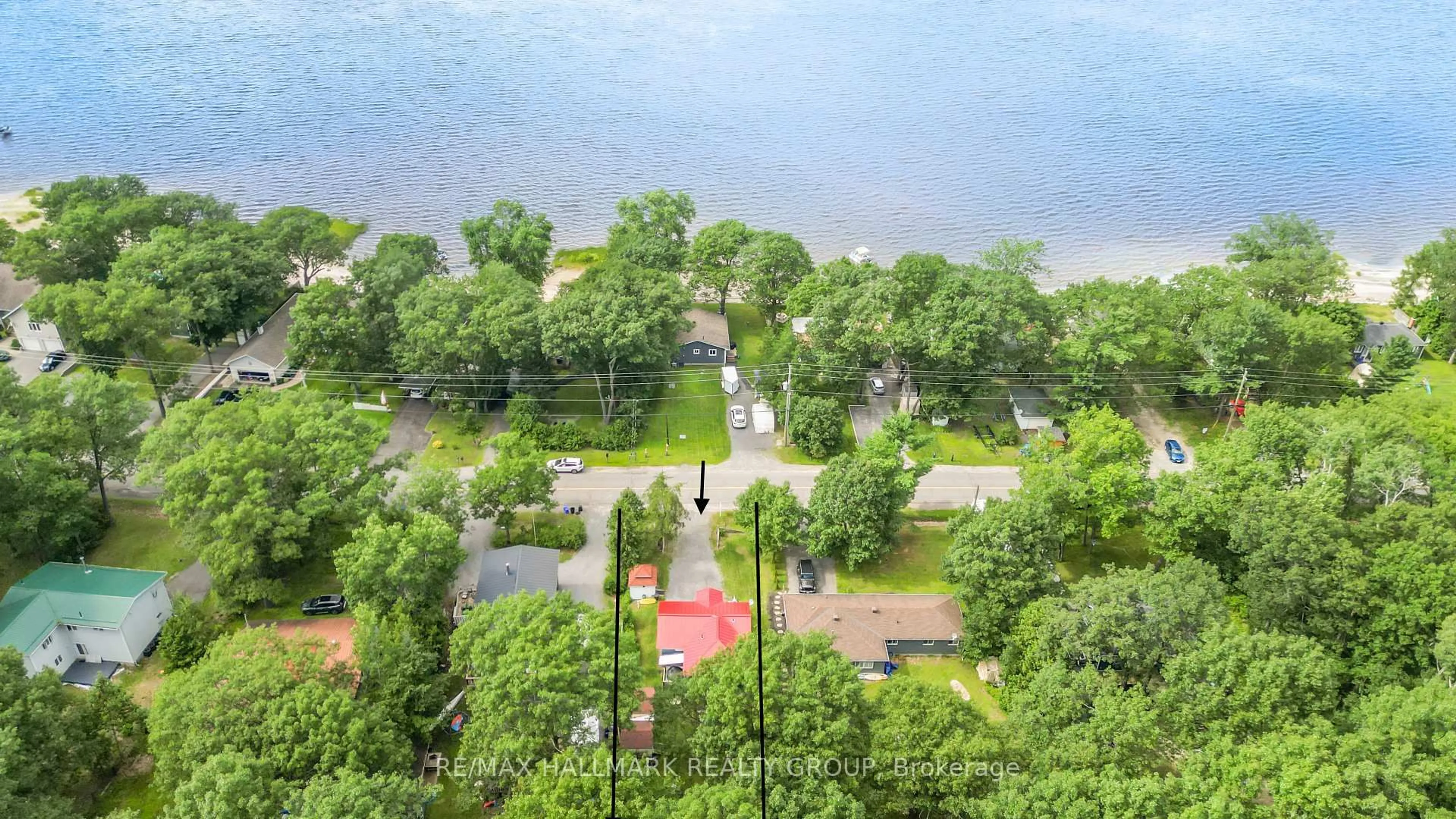 A pic from outside/outdoor area/front of a property/back of a property/a pic from drone, water/lake/river/ocean view for 715 Bayview Dr, Ottawa Ontario K0A 3M0