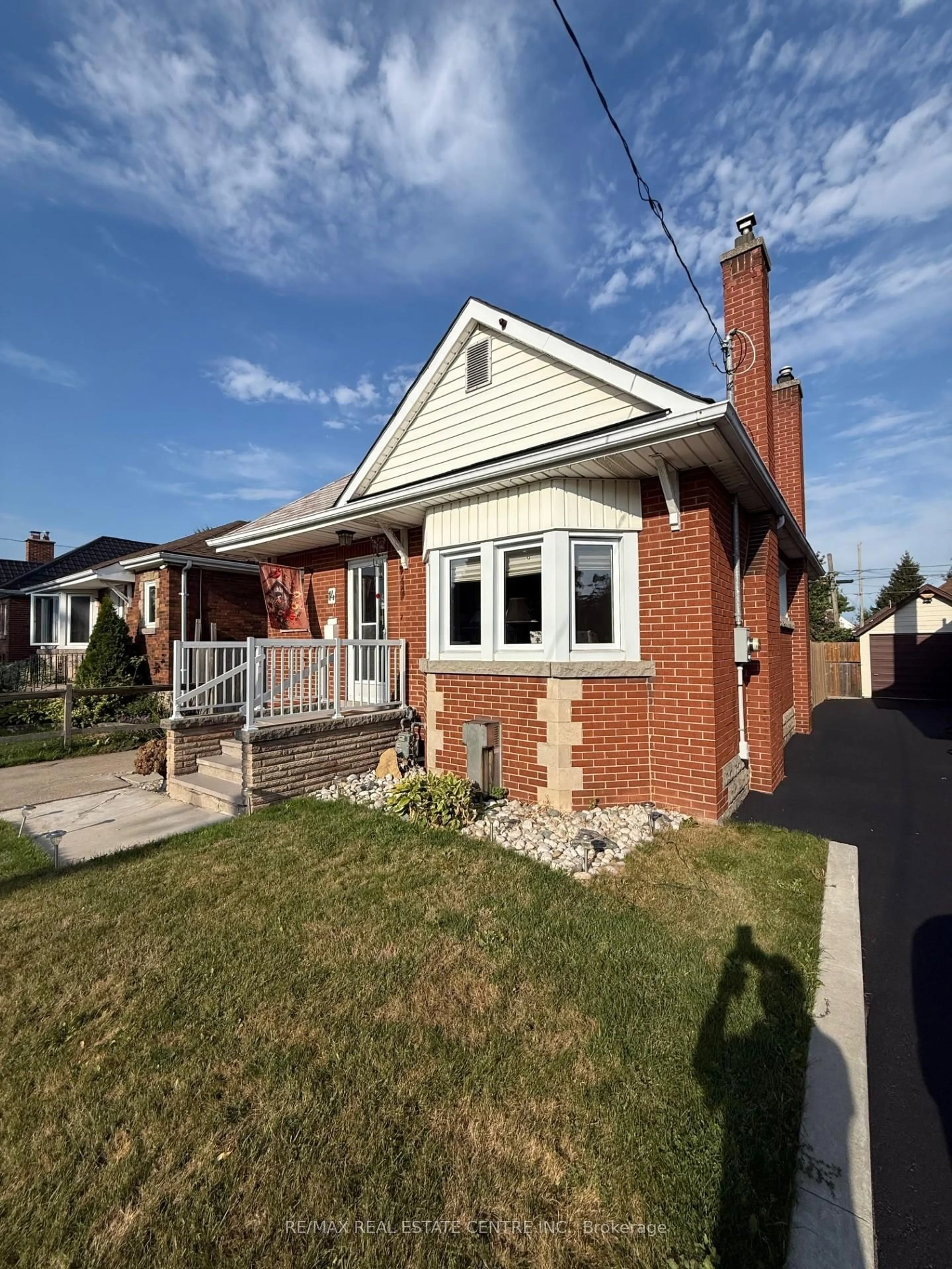 Home with brick exterior material, street for 14 Barons Ave, Hamilton Ontario L8K 2X9