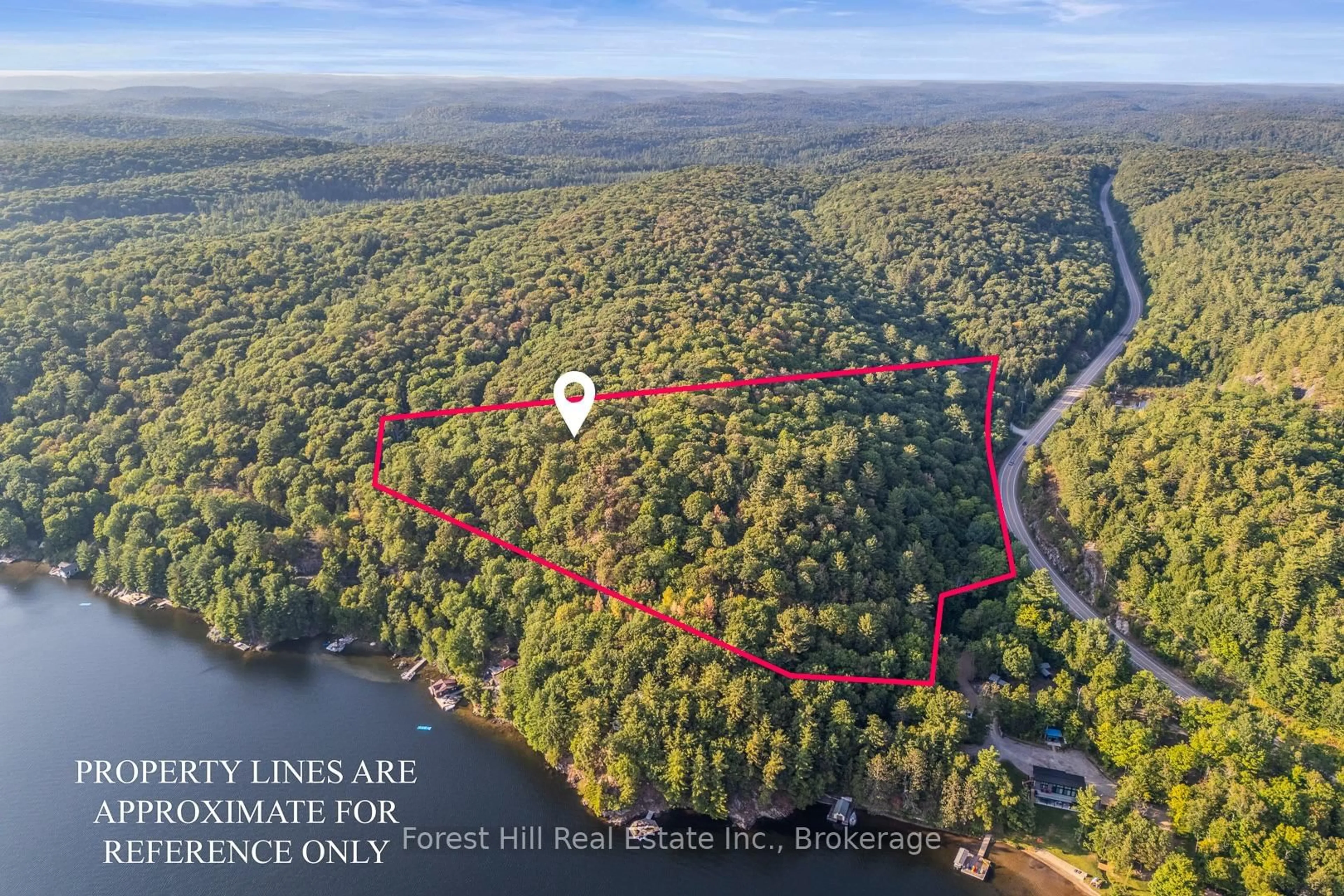 A pic from outside/outdoor area/front of a property/back of a property/a pic from drone, water/lake/river/ocean view for 2611 Highway 35, Lake of Bays Ontario P0A 1E0
