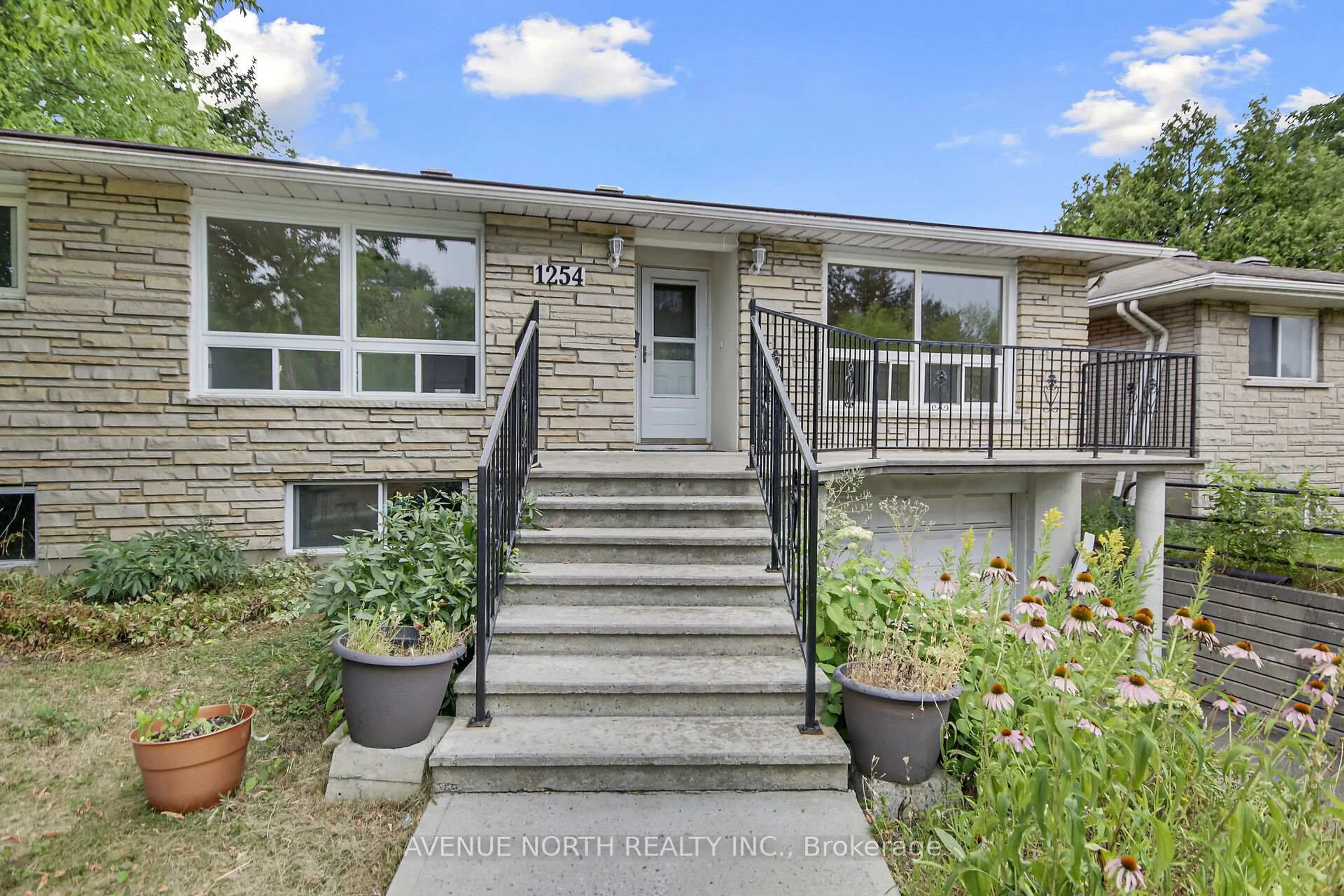 Home with brick exterior material, street for 1254 Heron Rd, Ottawa Ontario K1V 6A9