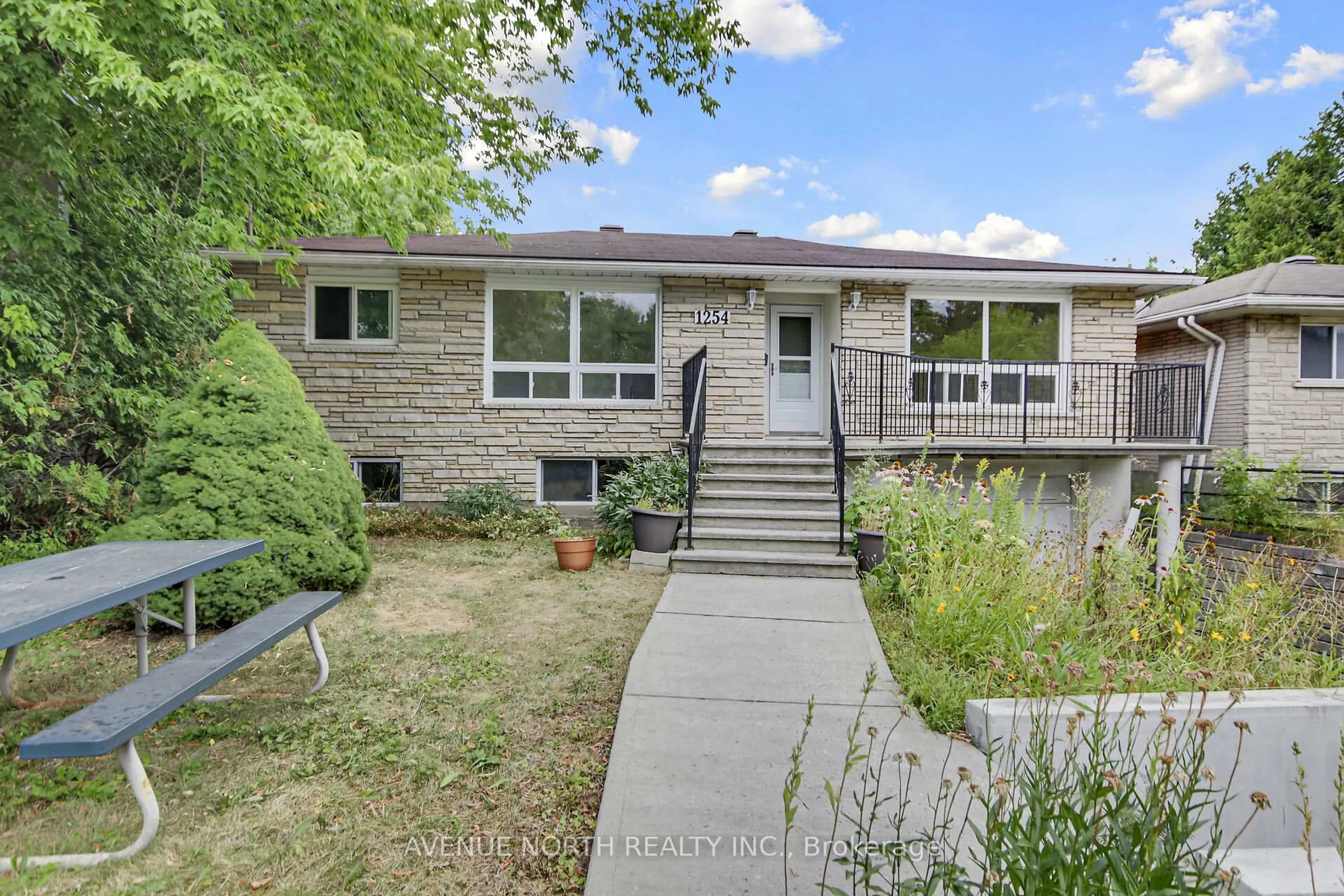 Home with brick exterior material, street for 1254 Heron Rd, Ottawa Ontario K1V 6A9