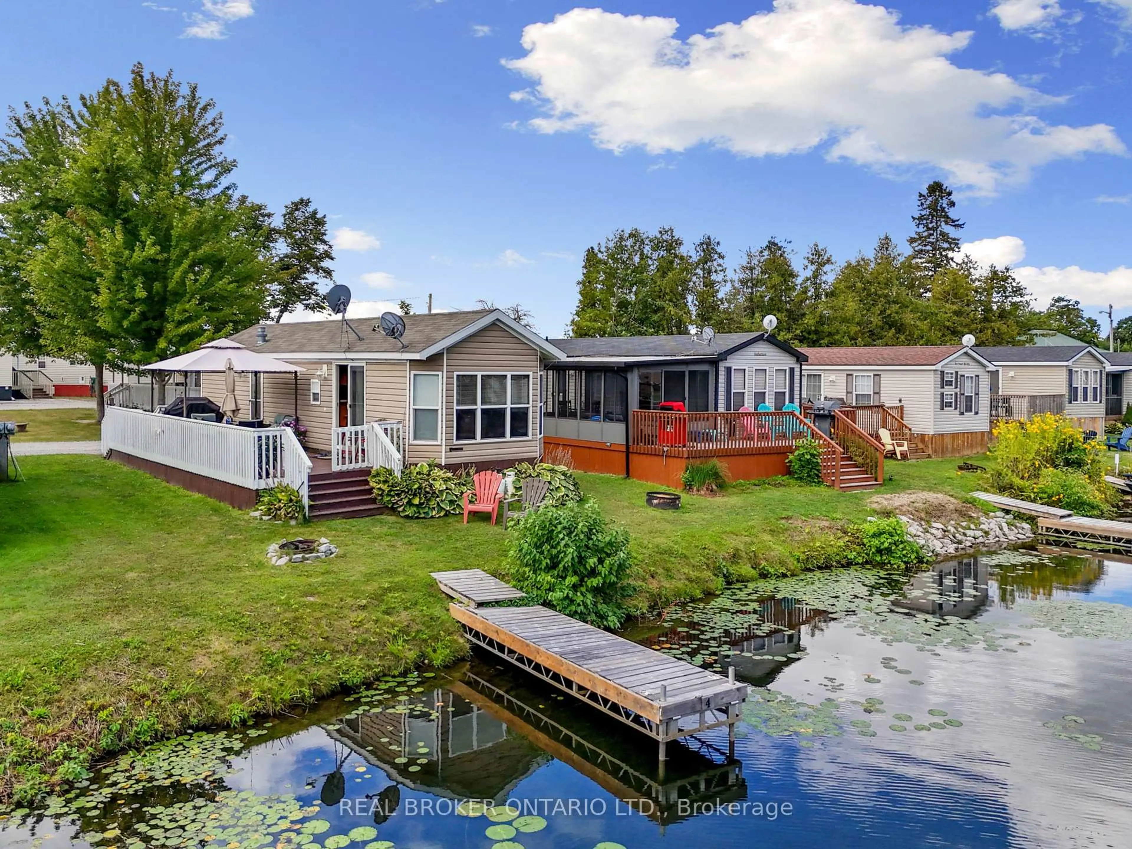A pic from outside/outdoor area/front of a property/back of a property/a pic from drone, water/lake/river/ocean view for 171 Woodland Estate Rd #CPC7, Trent Hills Ontario K0L 1L0