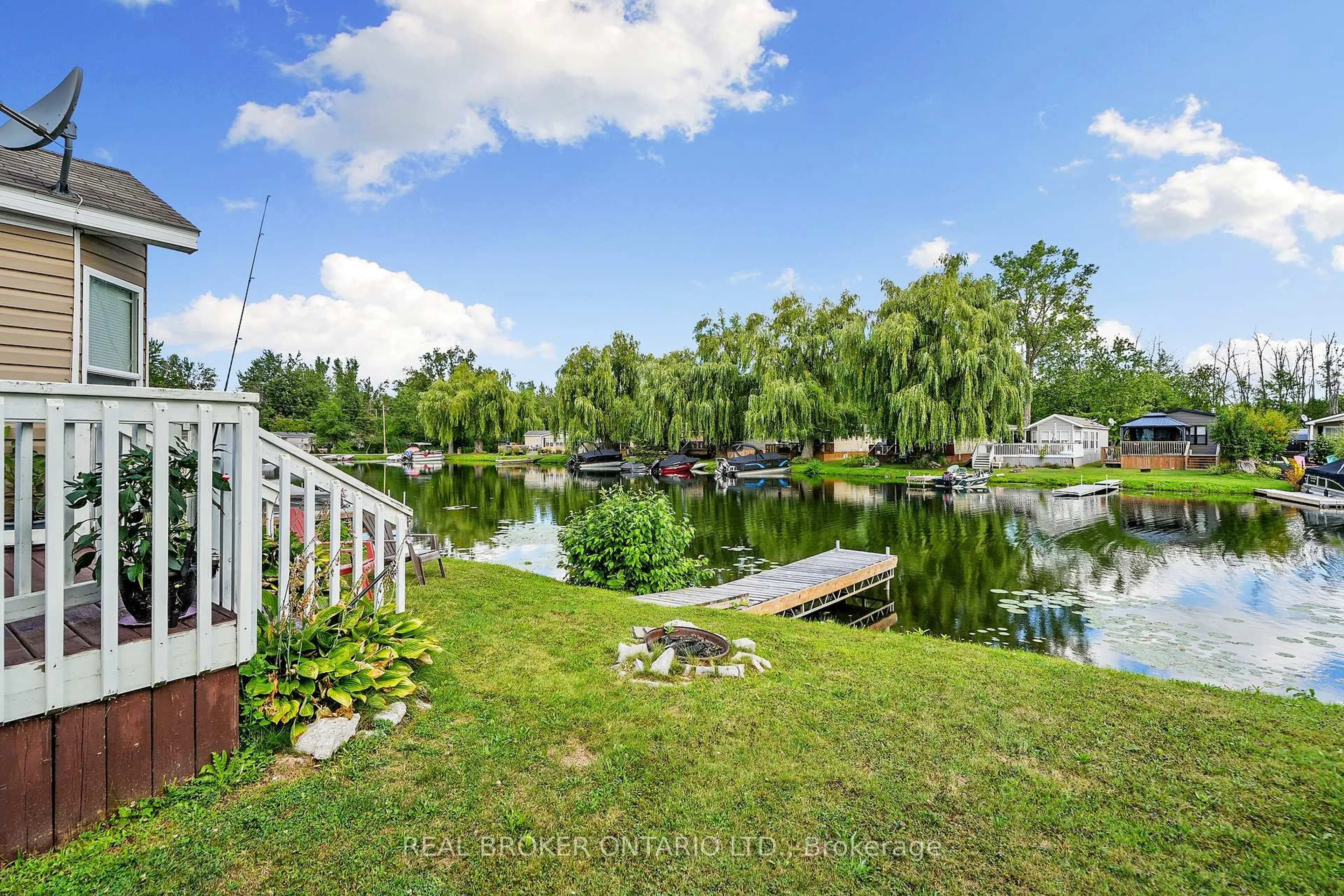 A pic from outside/outdoor area/front of a property/back of a property/a pic from drone, water/lake/river/ocean view for 171 Woodland Estate Rd #CPC7, Trent Hills Ontario K0L 1L0