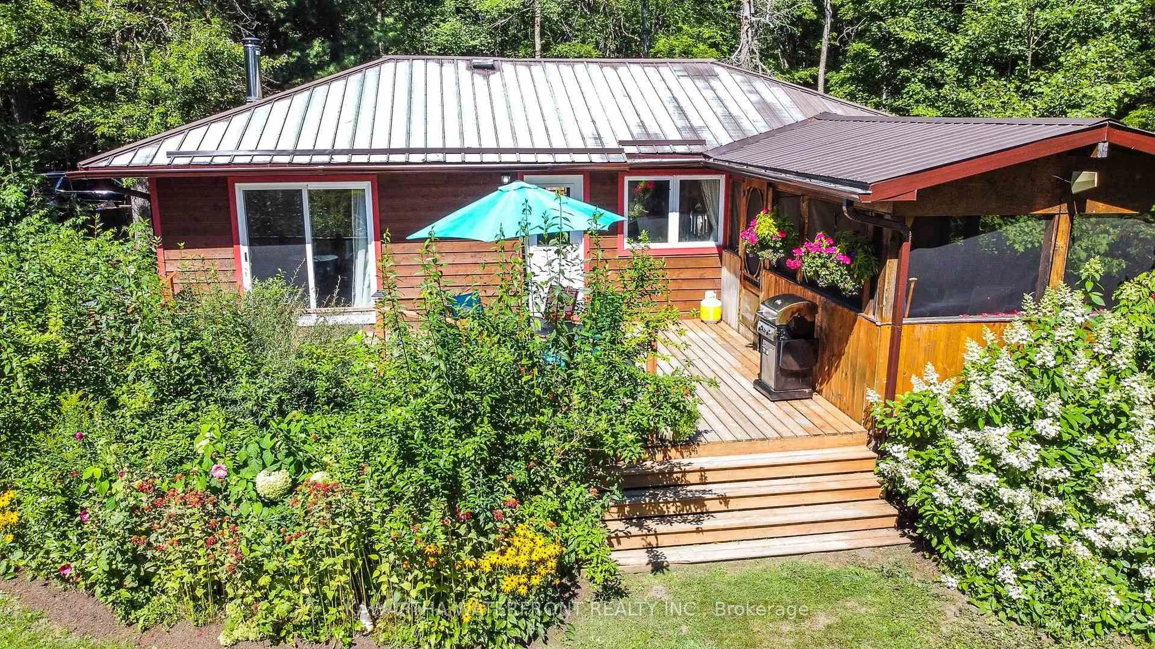 A pic from outside/outdoor area/front of a property/back of a property/a pic from drone, unknown for 1025 Nystedt Lane, Minden Hills Ontario K0M 2A1
