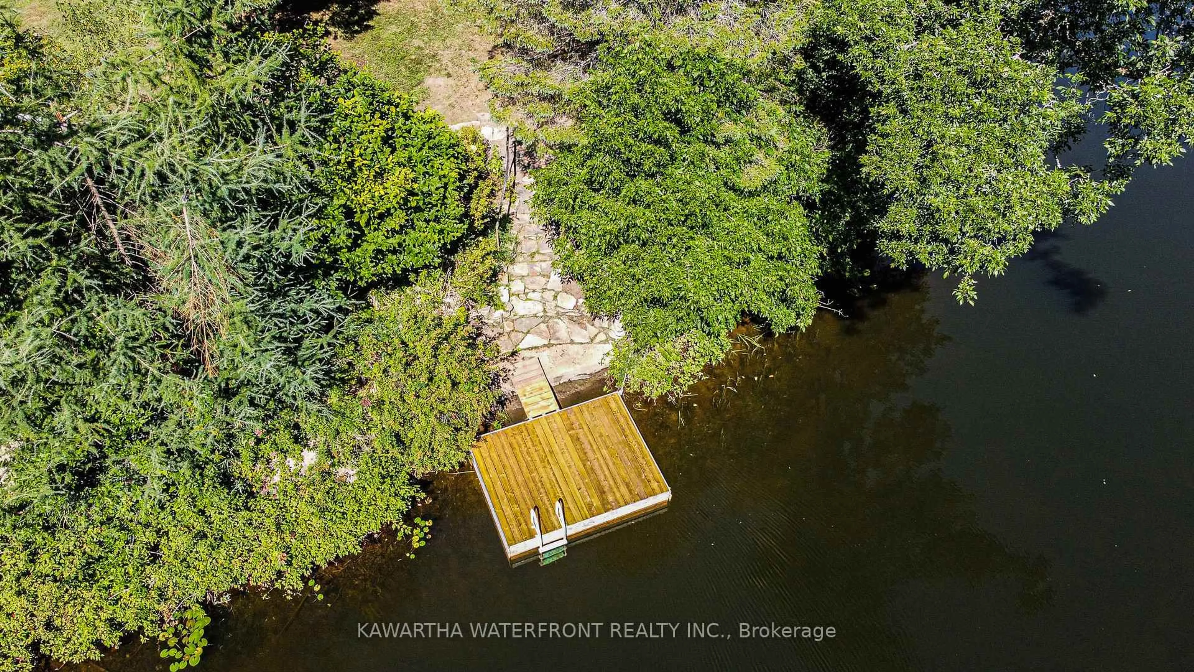 A pic from outside/outdoor area/front of a property/back of a property/a pic from drone, water/lake/river/ocean view for 1025 Nystedt Lane, Minden Hills Ontario K0M 2A1