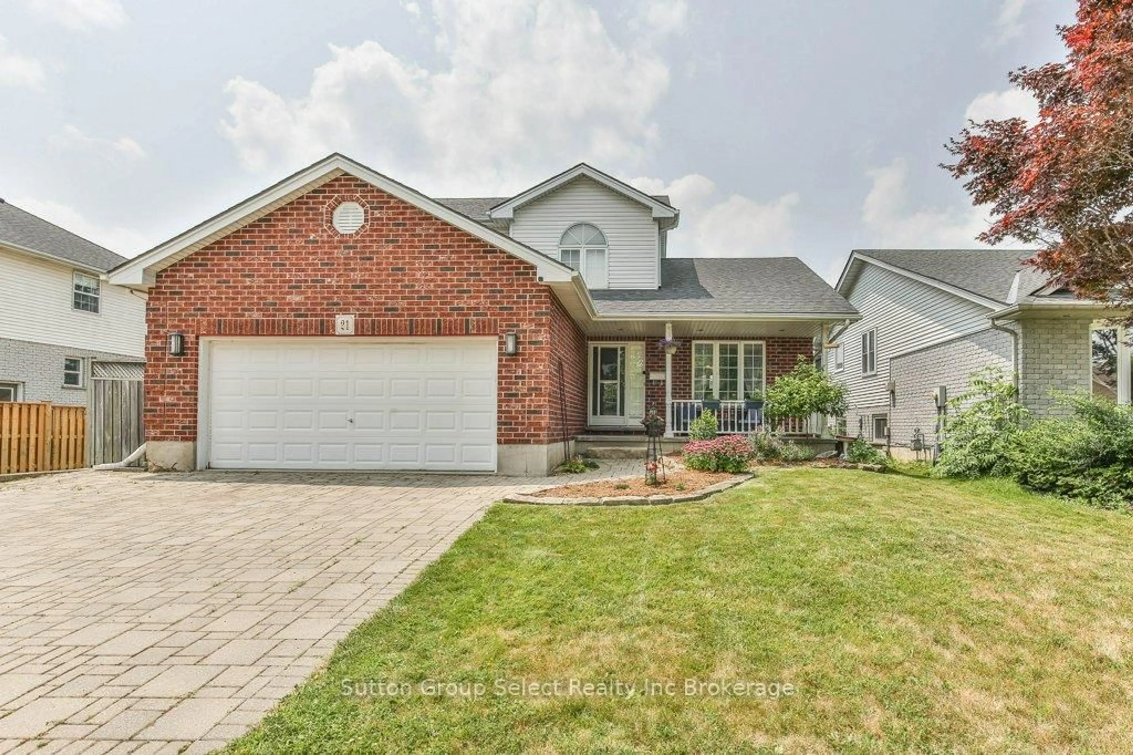 Home with brick exterior material, street for 21 Heron Ave, Woodstock Ontario N4T 1T1
