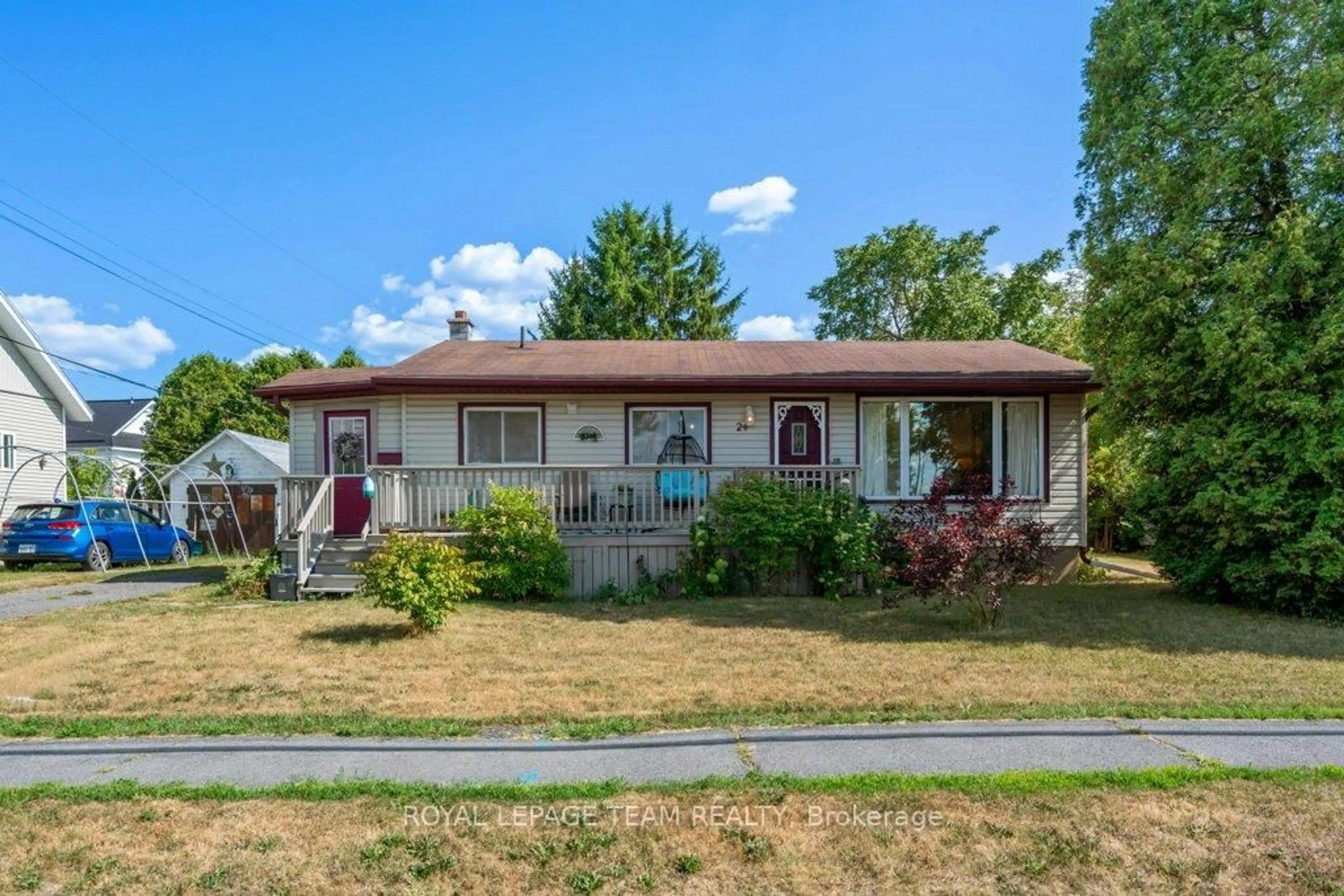Home with vinyl exterior material, street for 24 Beach Ave, South Dundas Ontario K0E 1K0