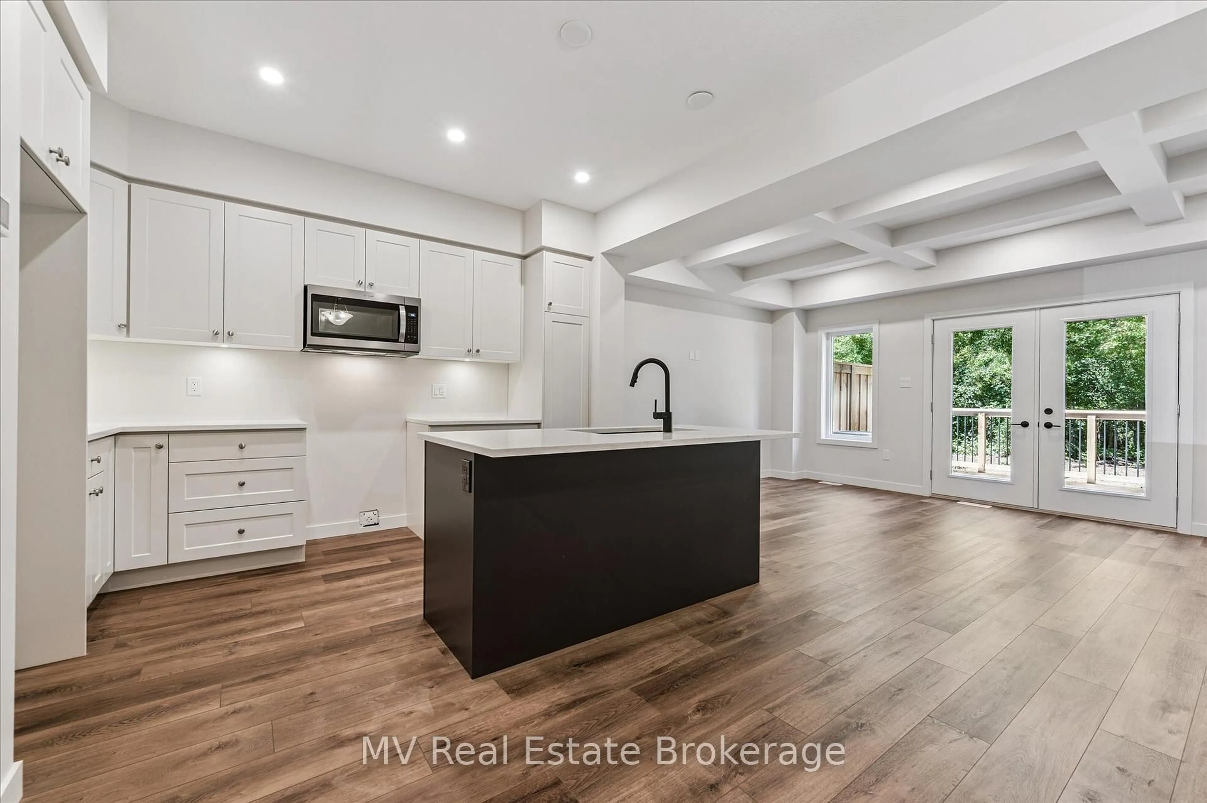 Open concept kitchen, unknown for 46 Fieldstone Lane Private, Centre Wellington Ontario N0B 1S0