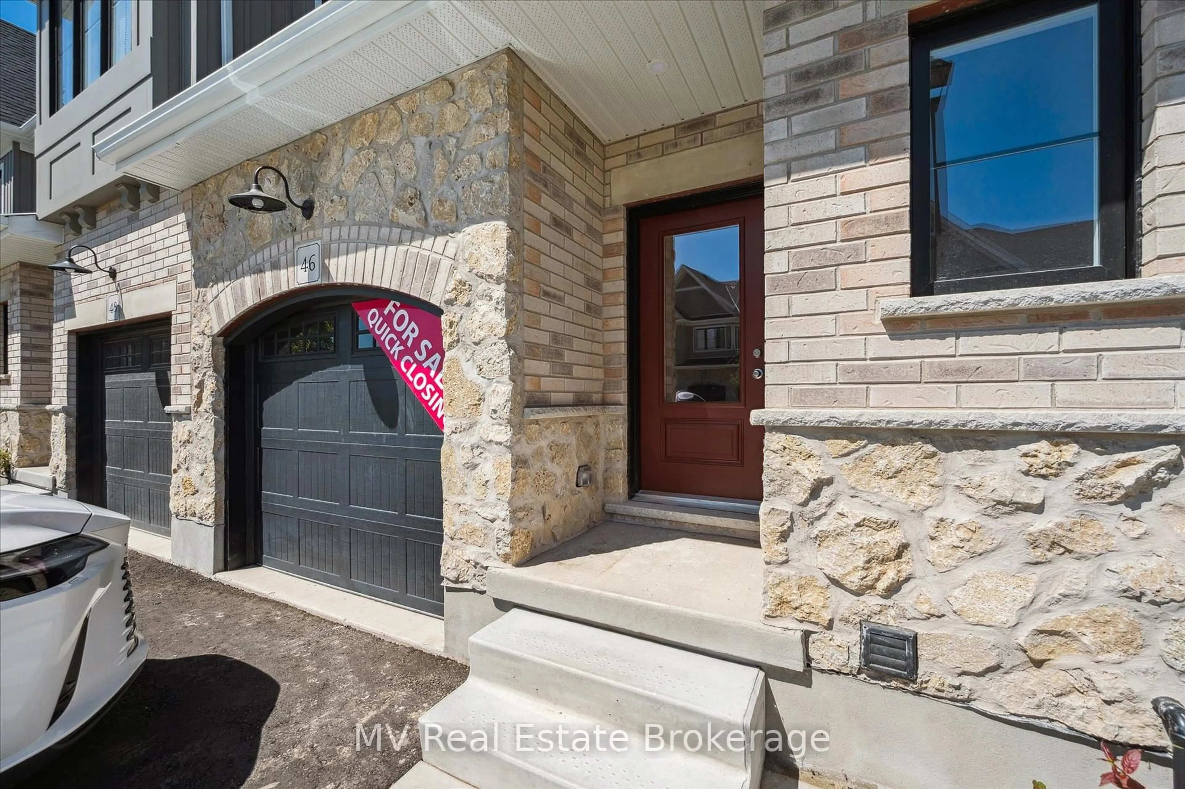 Home with brick exterior material, street for 46 Fieldstone Lane Private, Centre Wellington Ontario N0B 1S0
