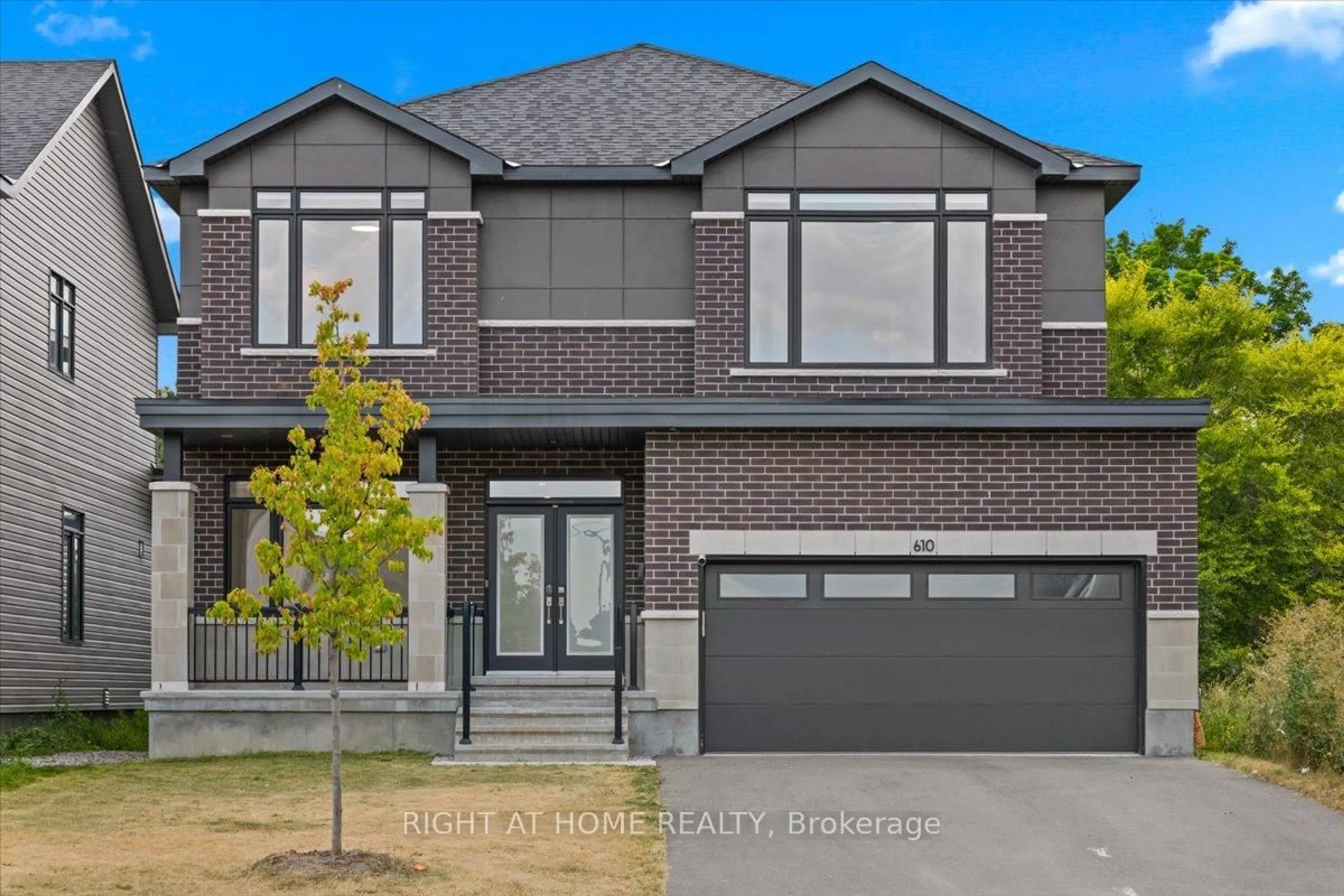 Home with brick exterior material, street for 610 KENABEEK Terr, Manotick Ontario K4M 0M3