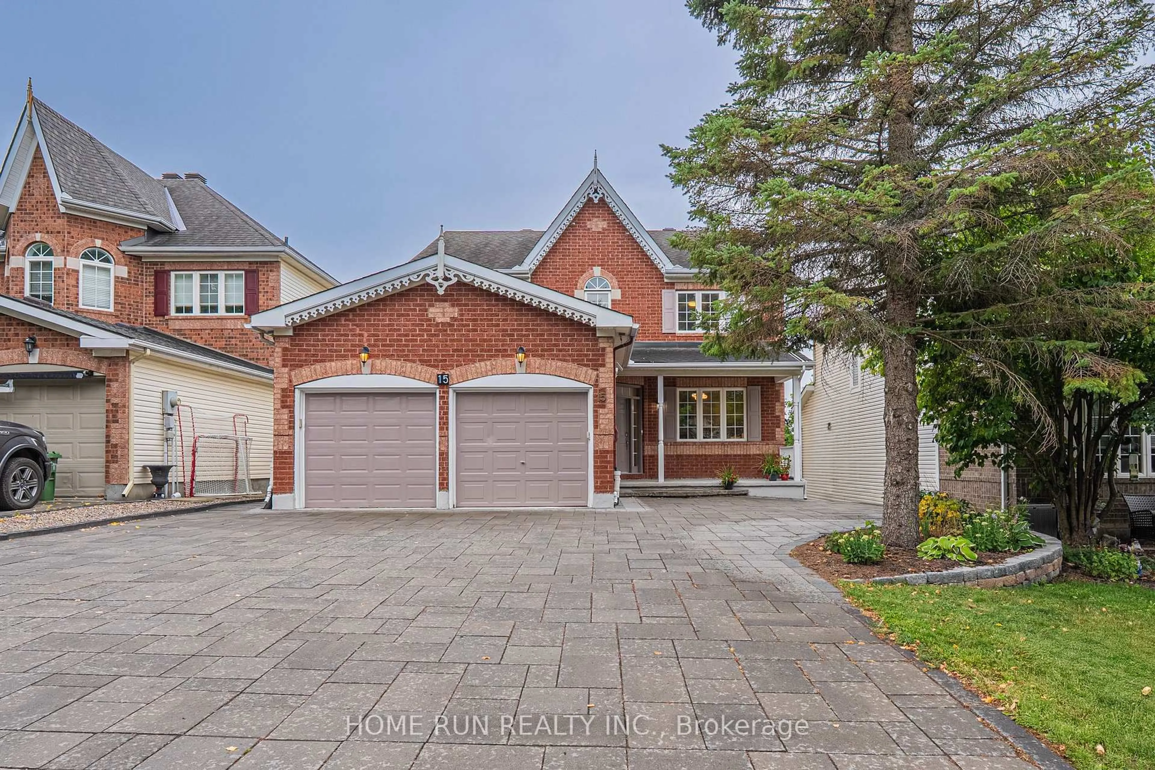 Home with brick exterior material, street for 15 Cheltonia Way, Ottawa Ontario K2T 1G6
