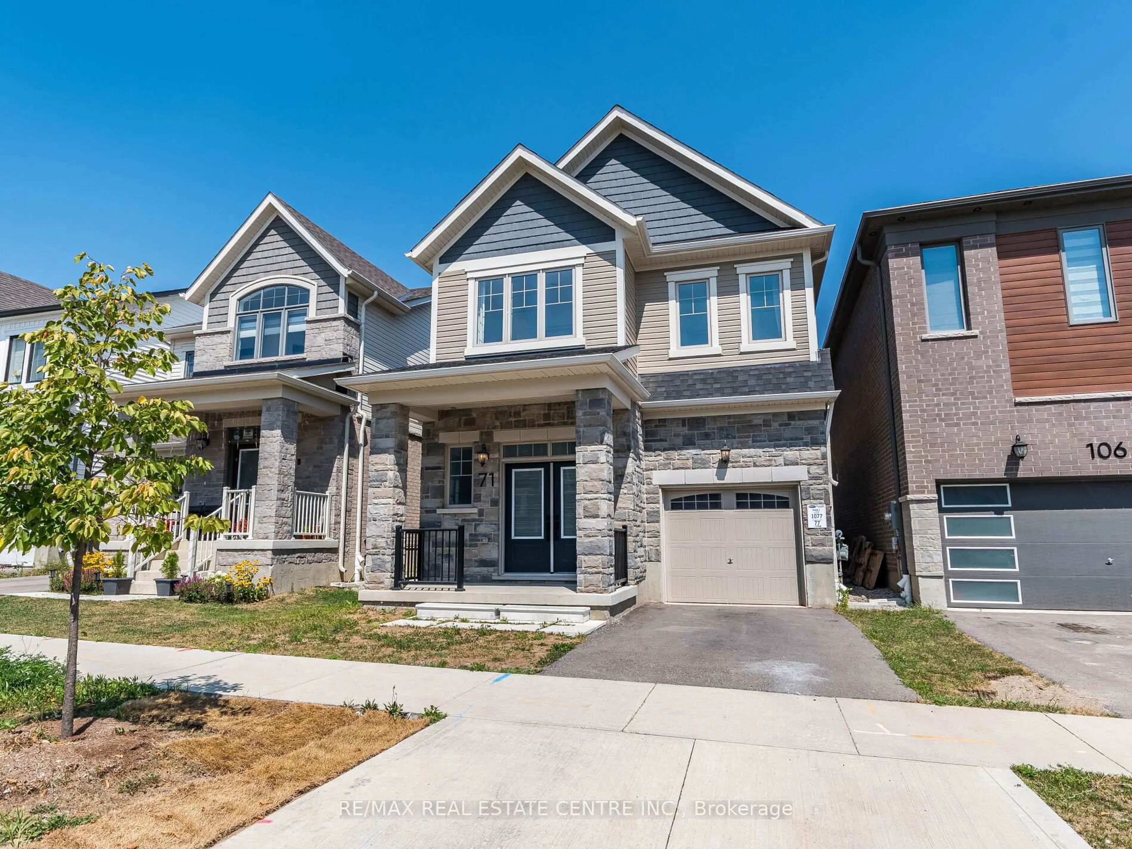 Home with brick exterior material, street for 71 Routley St, Kitchener Ontario N2E 3X8
