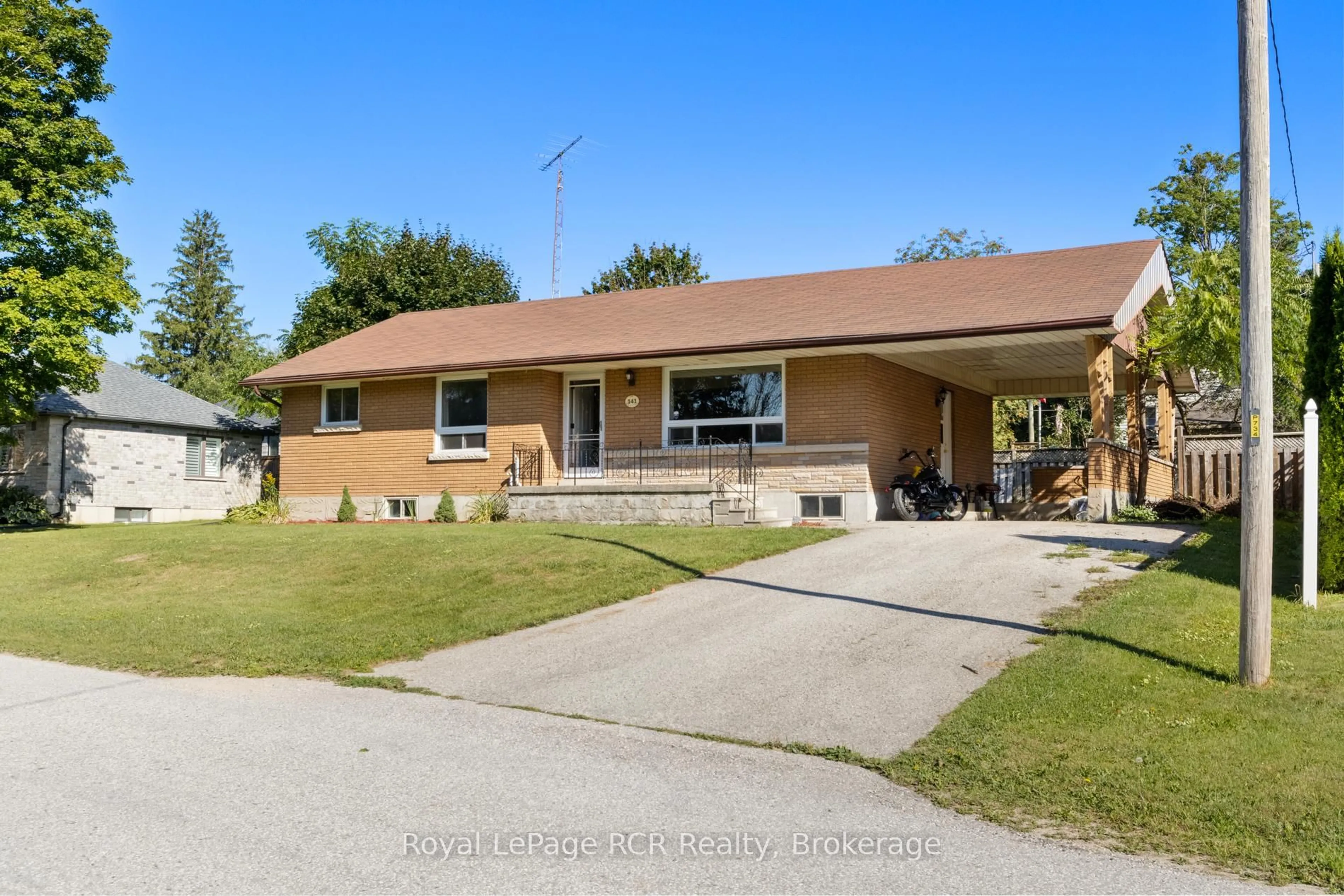 Home with brick exterior material, street for 141 North Water St, Wellington North Ontario N0G 2L3