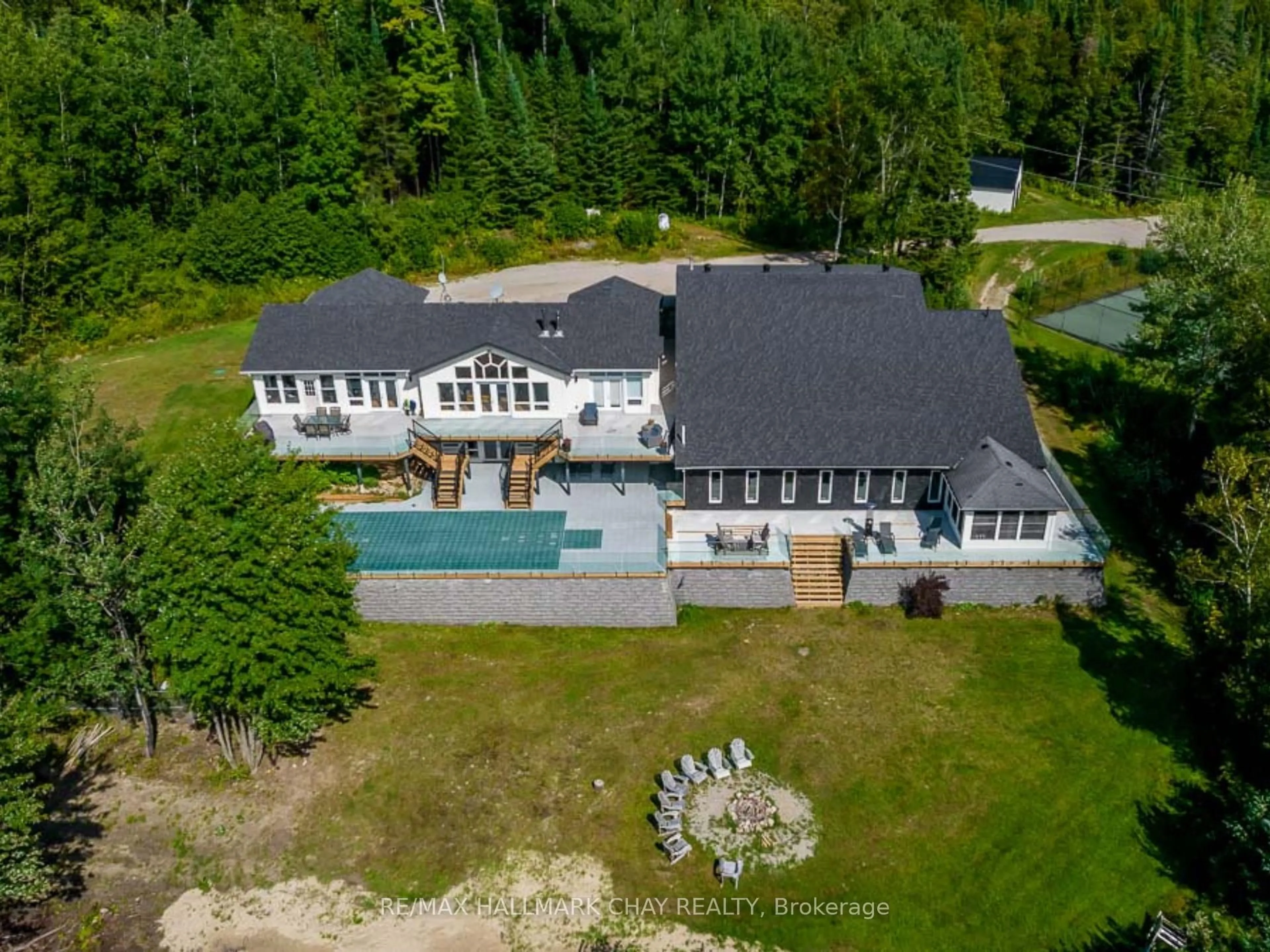 A pic from outside/outdoor area/front of a property/back of a property/a pic from drone, water/lake/river/ocean view for 2318 Pickerel & Jack Lake Rd, Armour Ontario P0A 1C0