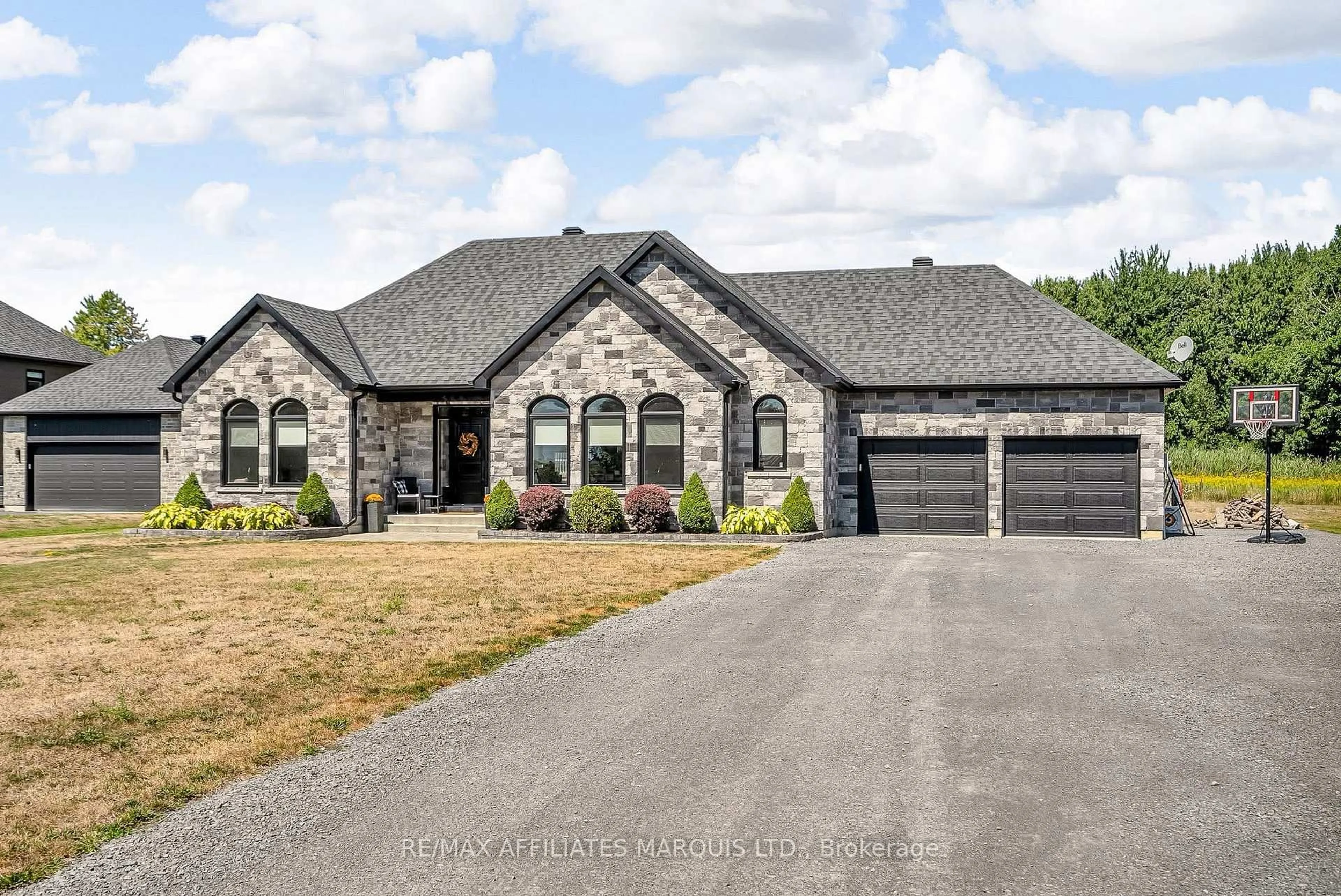 Home with brick exterior material, street for 20531 Old Montreal Rd, South Glengarry Ontario K0C 2C0