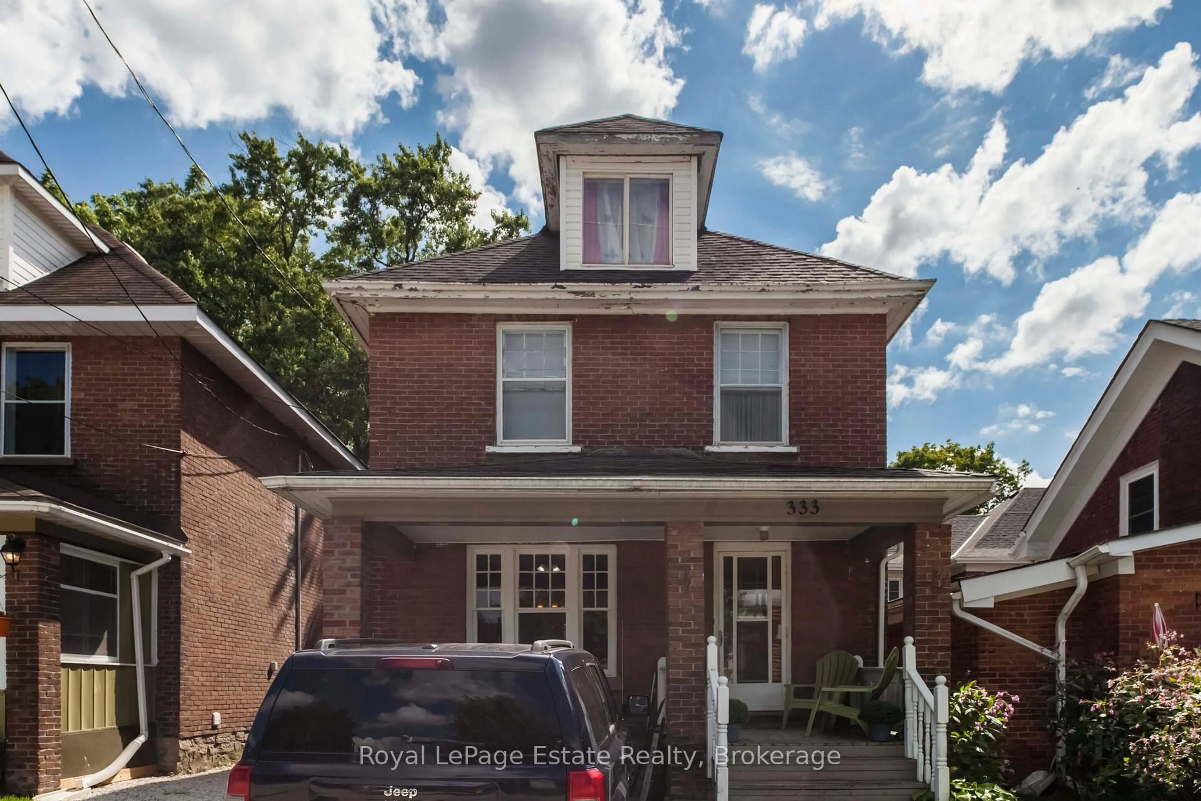 Home with brick exterior material, street for 333 12th St, Owen Sound Ontario N4K 1W1