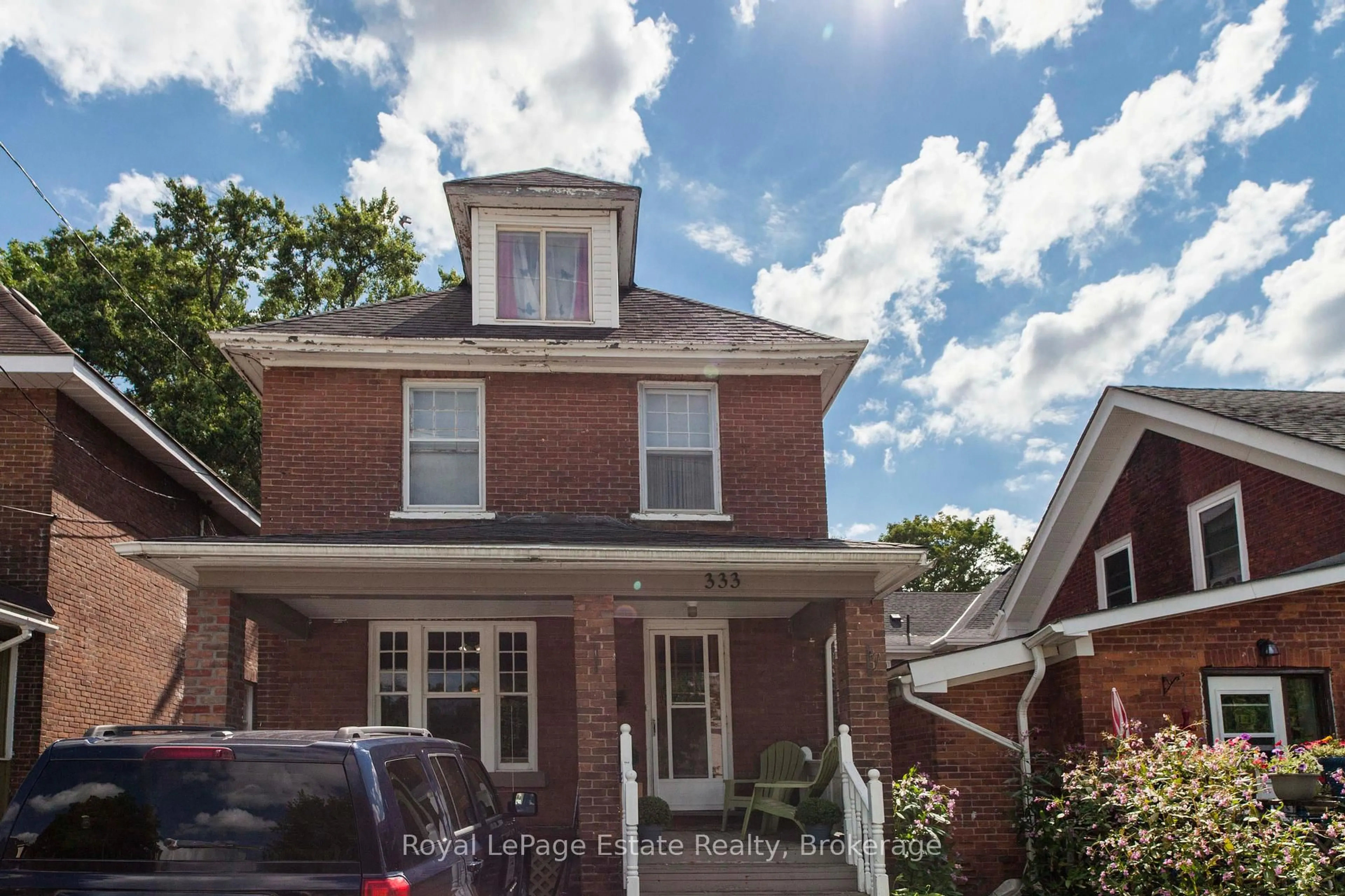 Home with brick exterior material, street for 333 12th St, Owen Sound Ontario N4K 1W1