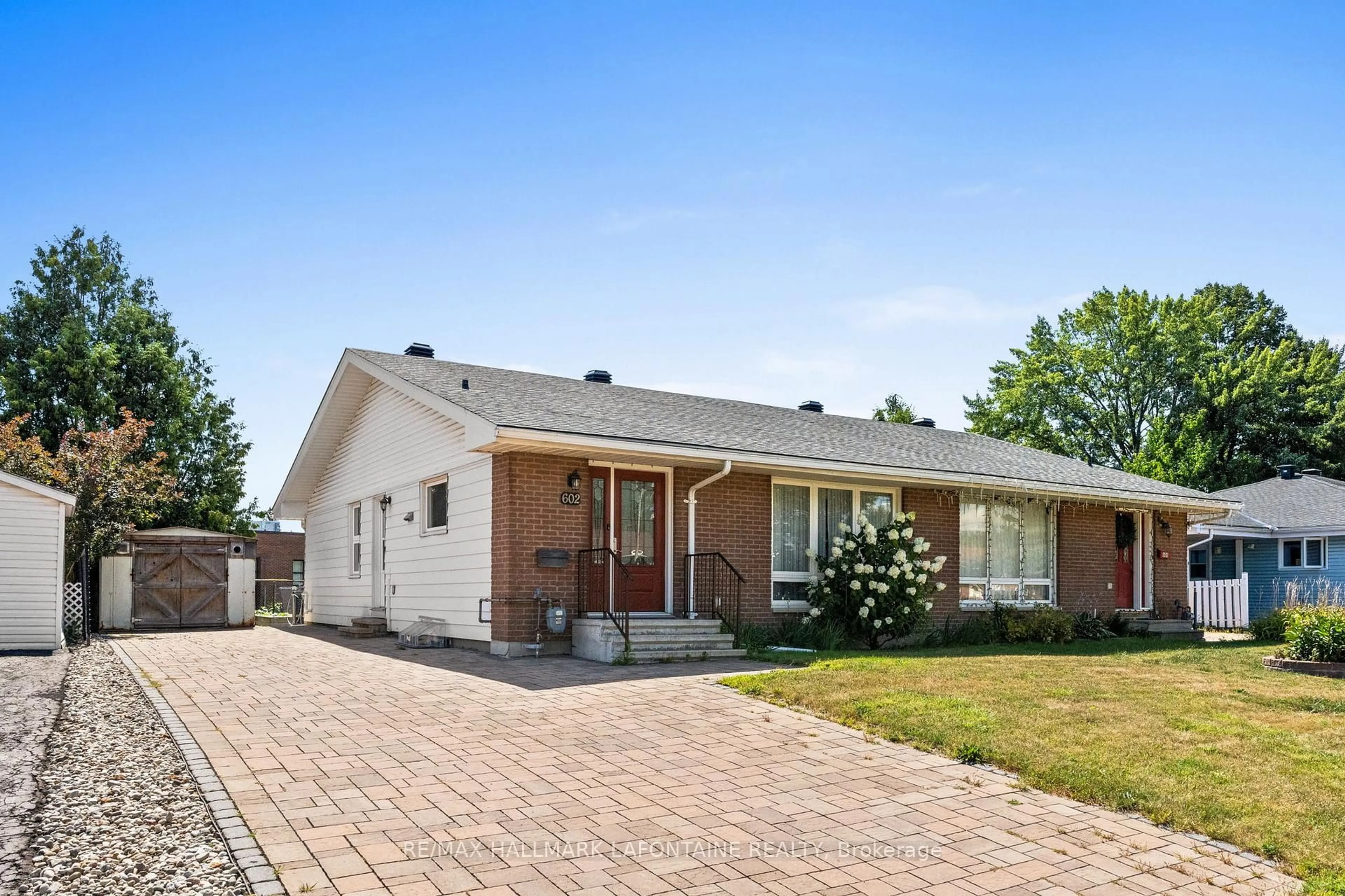 Home with brick exterior material, street for 602 Eastvale Dr, Ottawa Ontario K1J 6Z6