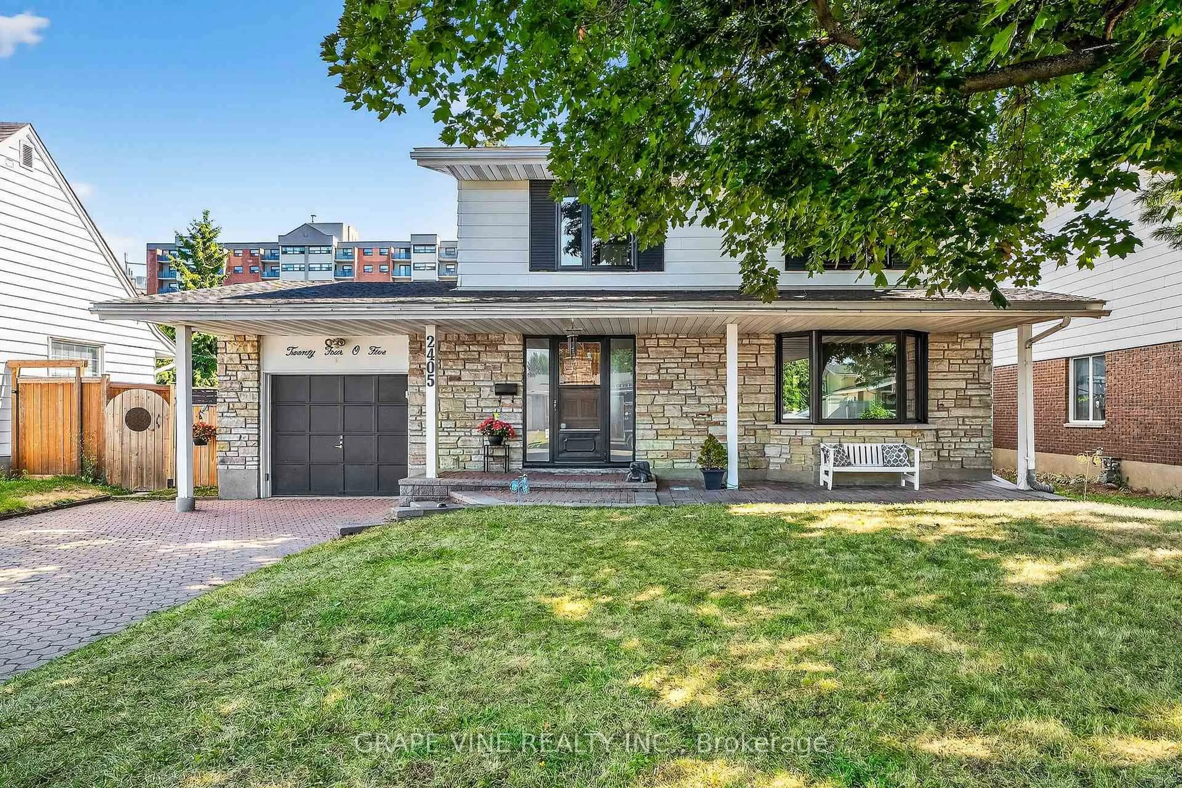 Home with brick exterior material, street for 2405 Dwight Cres, Ottawa Ontario K1G 1C7