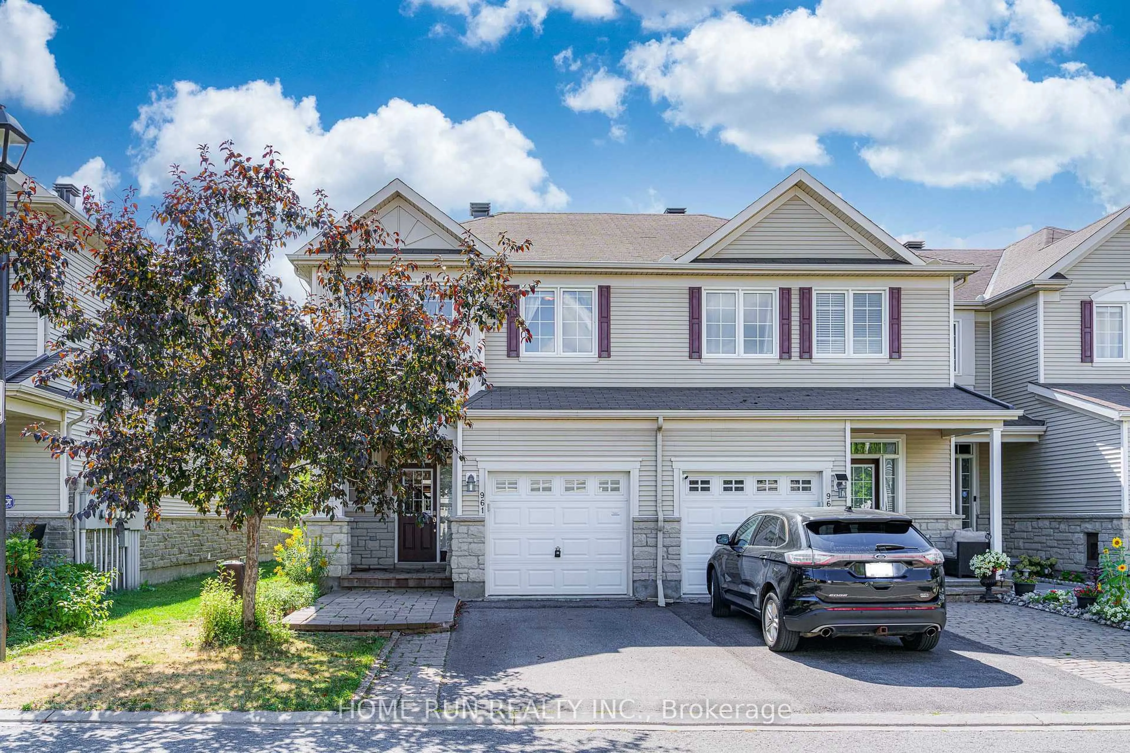 Home with vinyl exterior material, street for 961 Caldermill Private, Ottawa Ontario K2J 0Z7