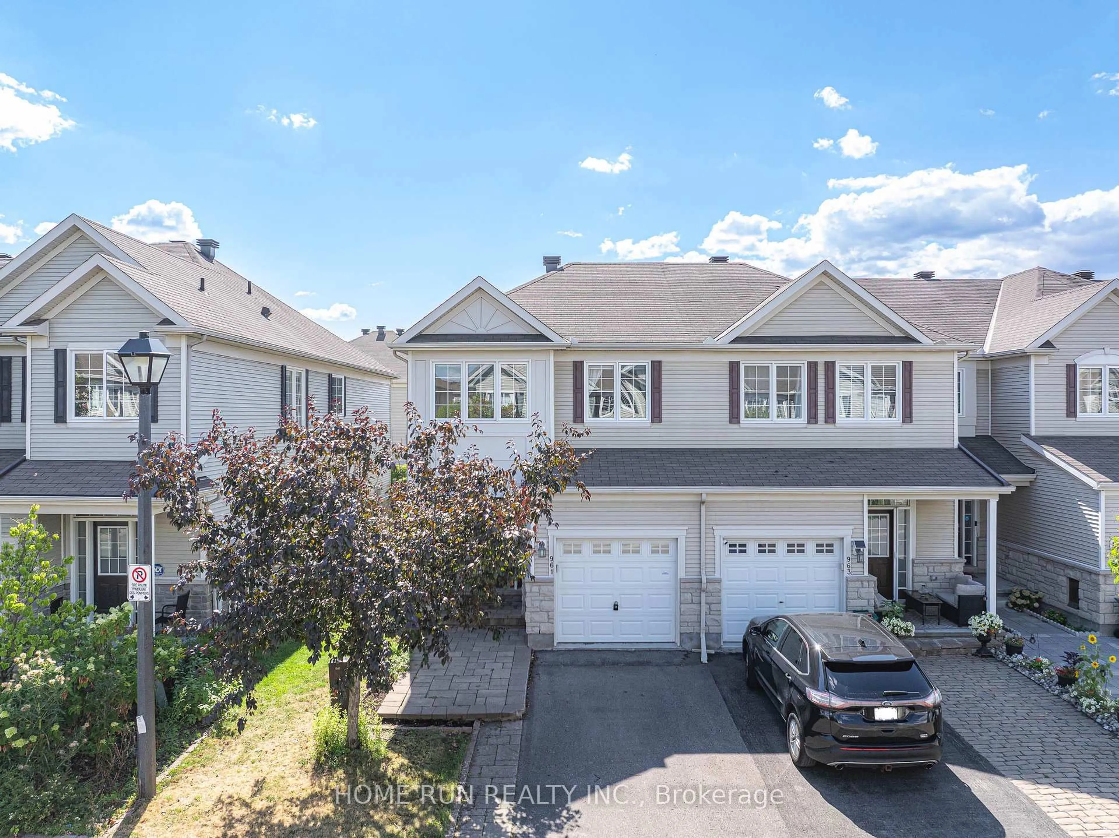 A pic from outside/outdoor area/front of a property/back of a property/a pic from drone, street for 961 Caldermill Private, Ottawa Ontario K2J 0Z7