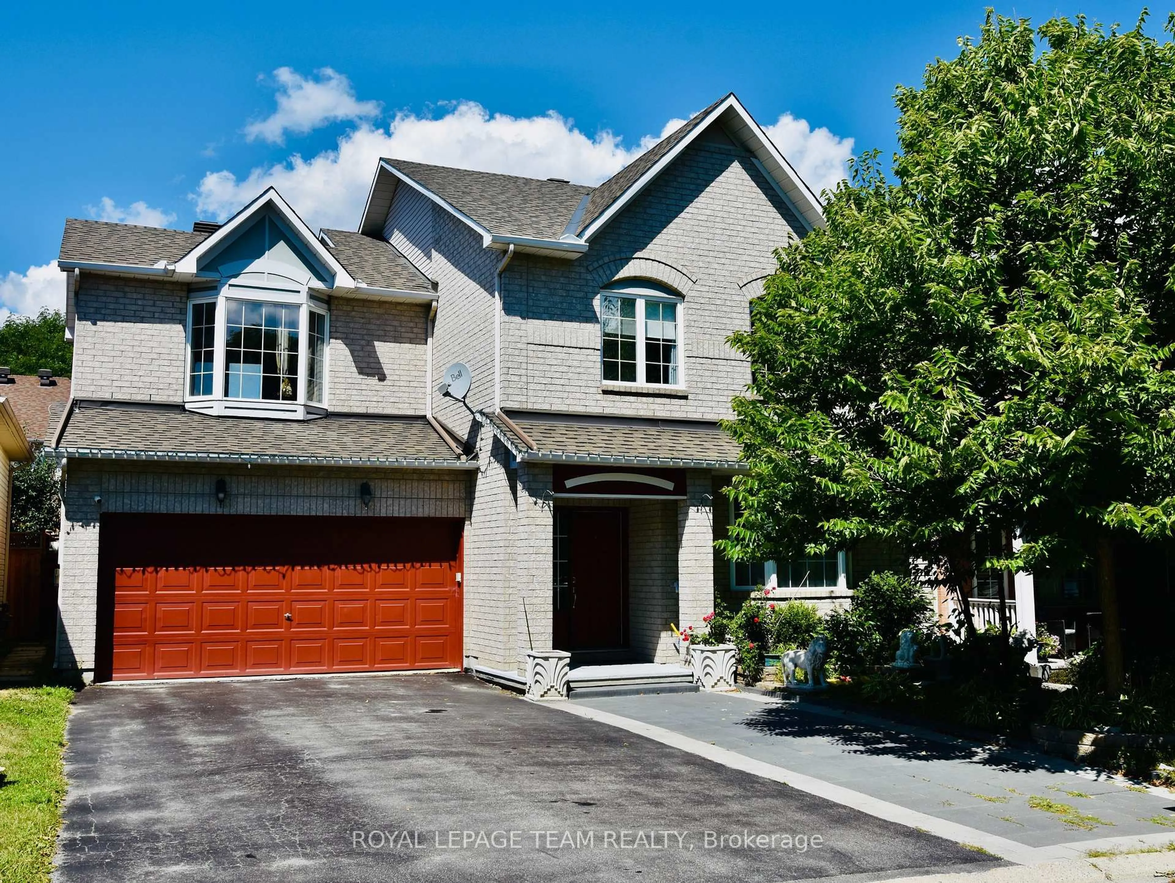 Home with brick exterior material, street for 18 Oakham Rdge, Ottawa Ontario K2K 3B3