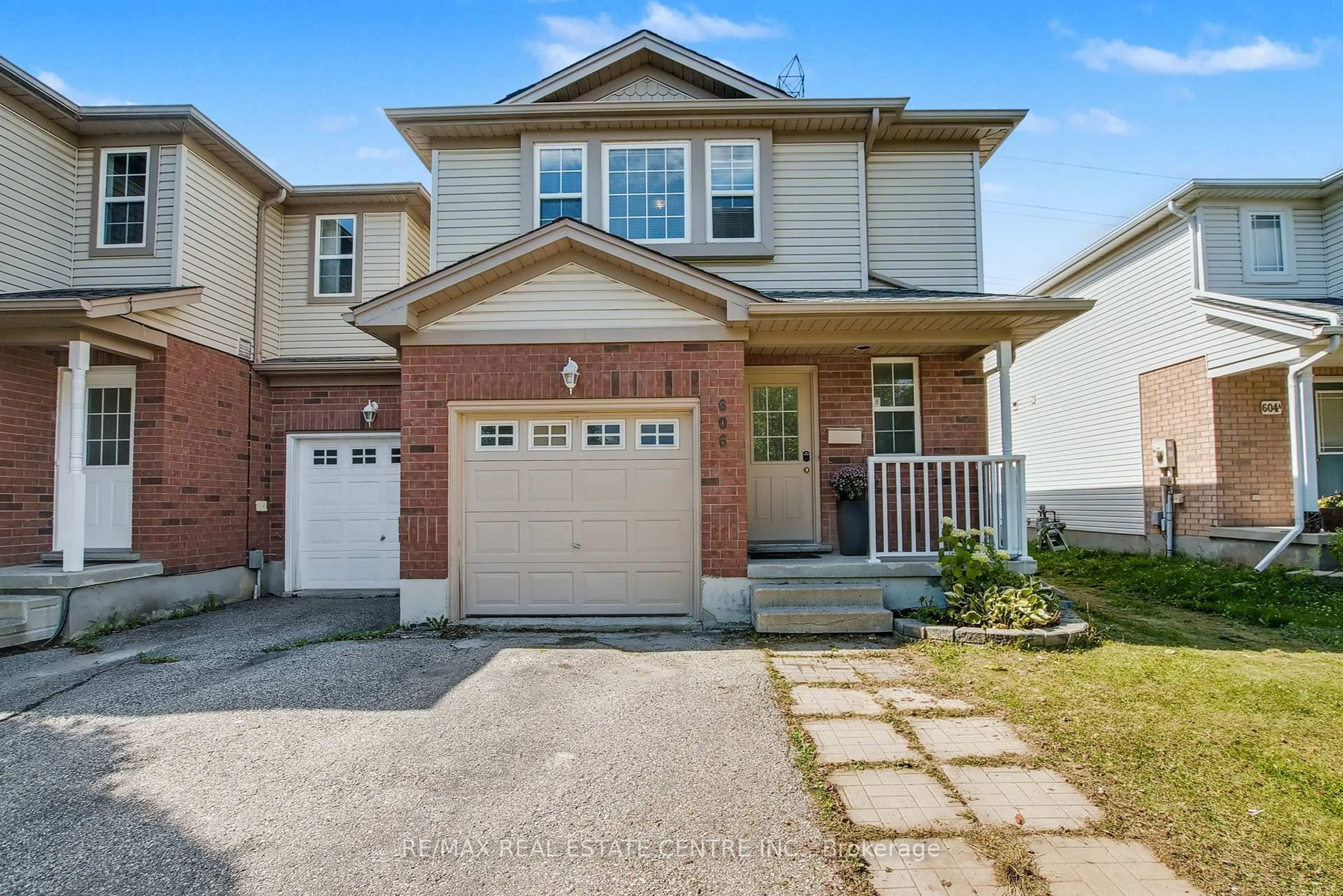 Home with brick exterior material, street for 606 Brandenburg Blvd, Waterloo Ontario N2T 2V3