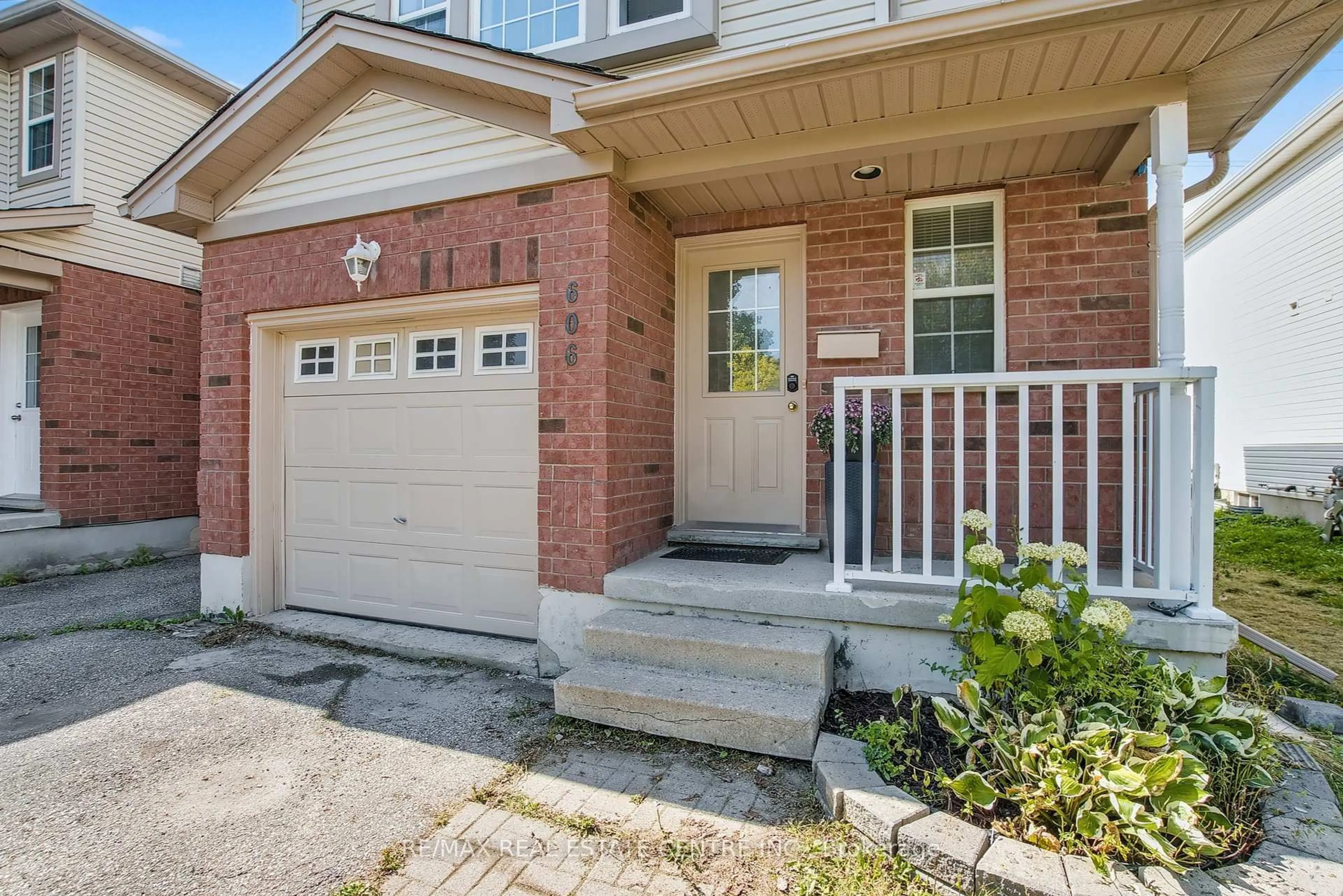 Home with brick exterior material, street for 606 Brandenburg Blvd, Waterloo Ontario N2T 2V3
