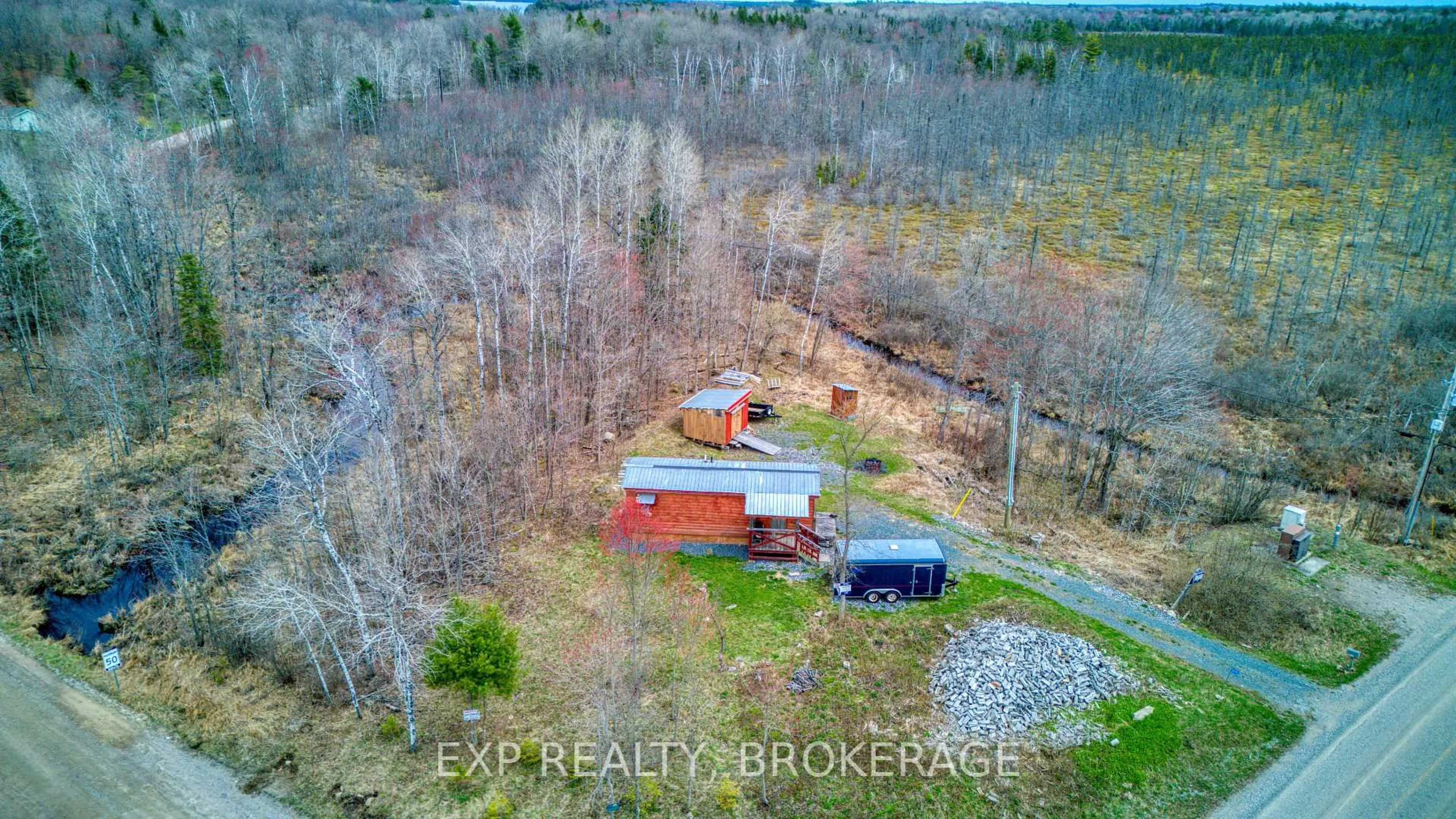 A pic from outside/outdoor area/front of a property/back of a property/a pic from drone, water/lake/river/ocean view for 2910 Henderson Rd, Arden Ontario K0H 1B0
