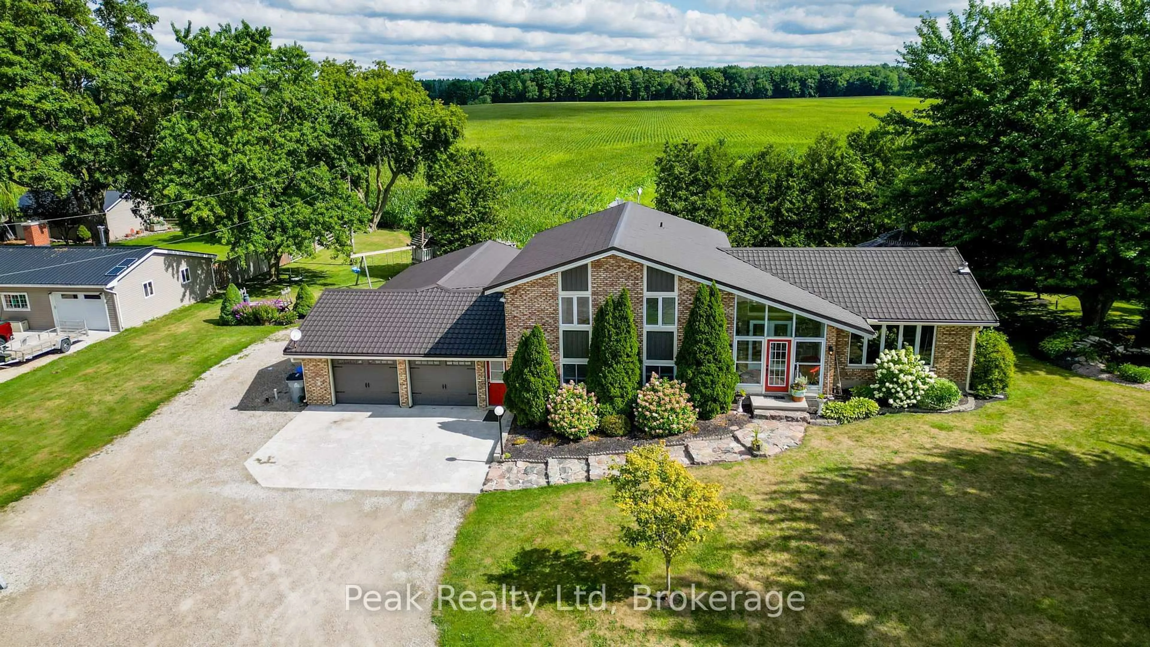 A pic from outside/outdoor area/front of a property/back of a property/a pic from drone, unknown for 6578 Line 86 Line, North Perth Ontario N4W 3G8
