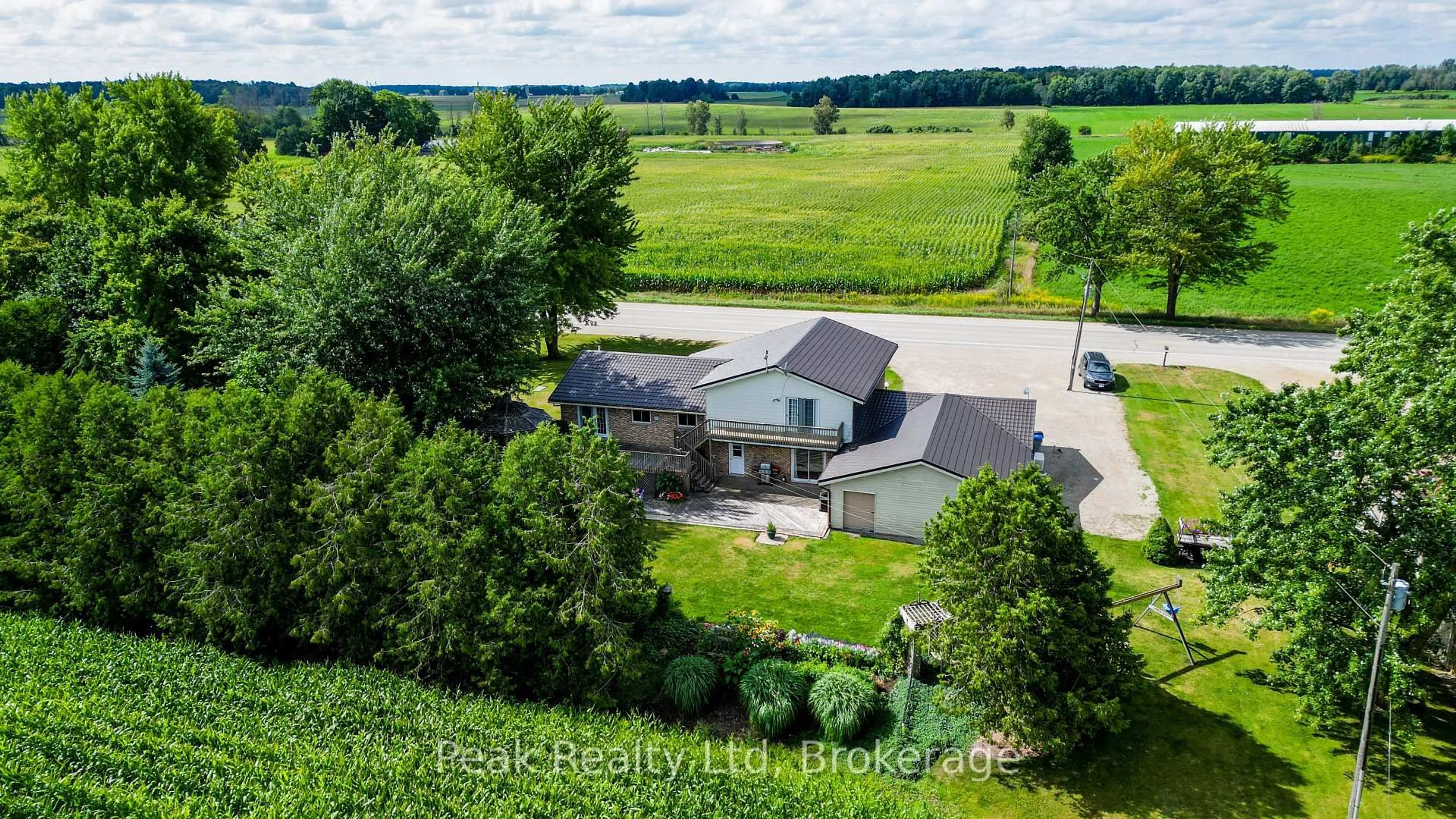 A pic from outside/outdoor area/front of a property/back of a property/a pic from drone, water/lake/river/ocean view for 6578 Line 86 Line, North Perth Ontario N4W 3G8