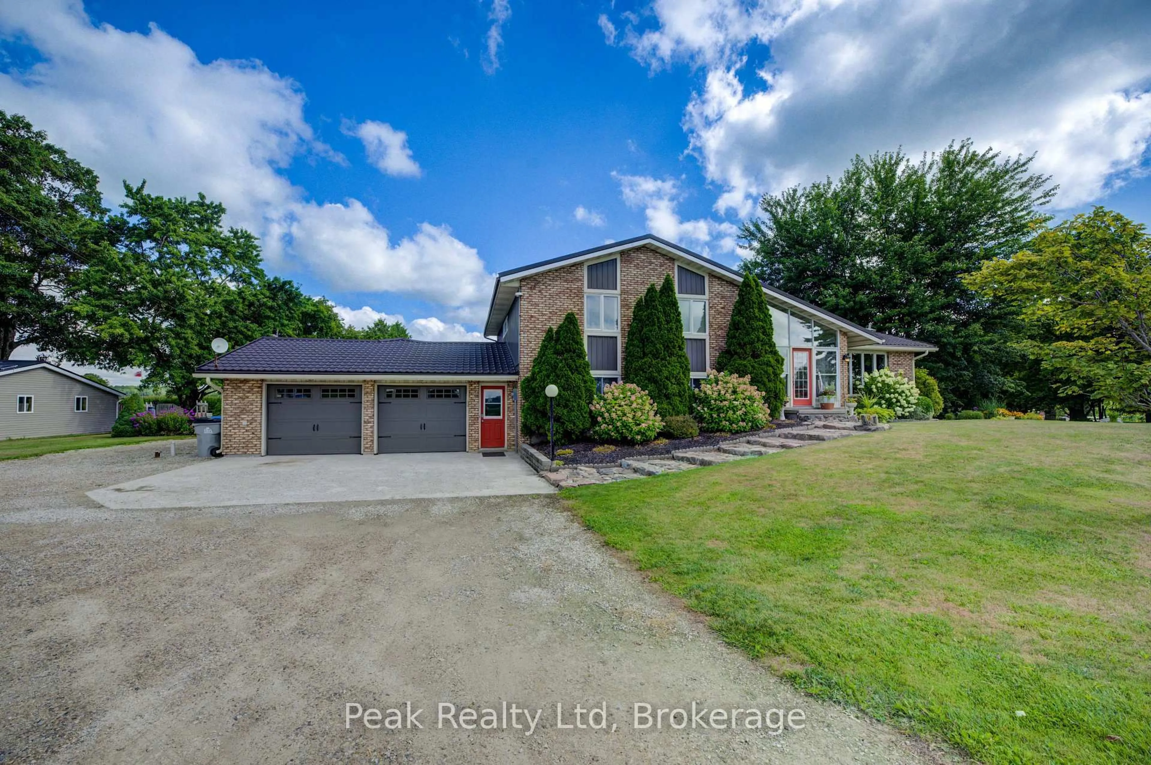 A pic from outside/outdoor area/front of a property/back of a property/a pic from drone, water/lake/river/ocean view for 6578 Line 86 Line, North Perth Ontario N4W 3G8