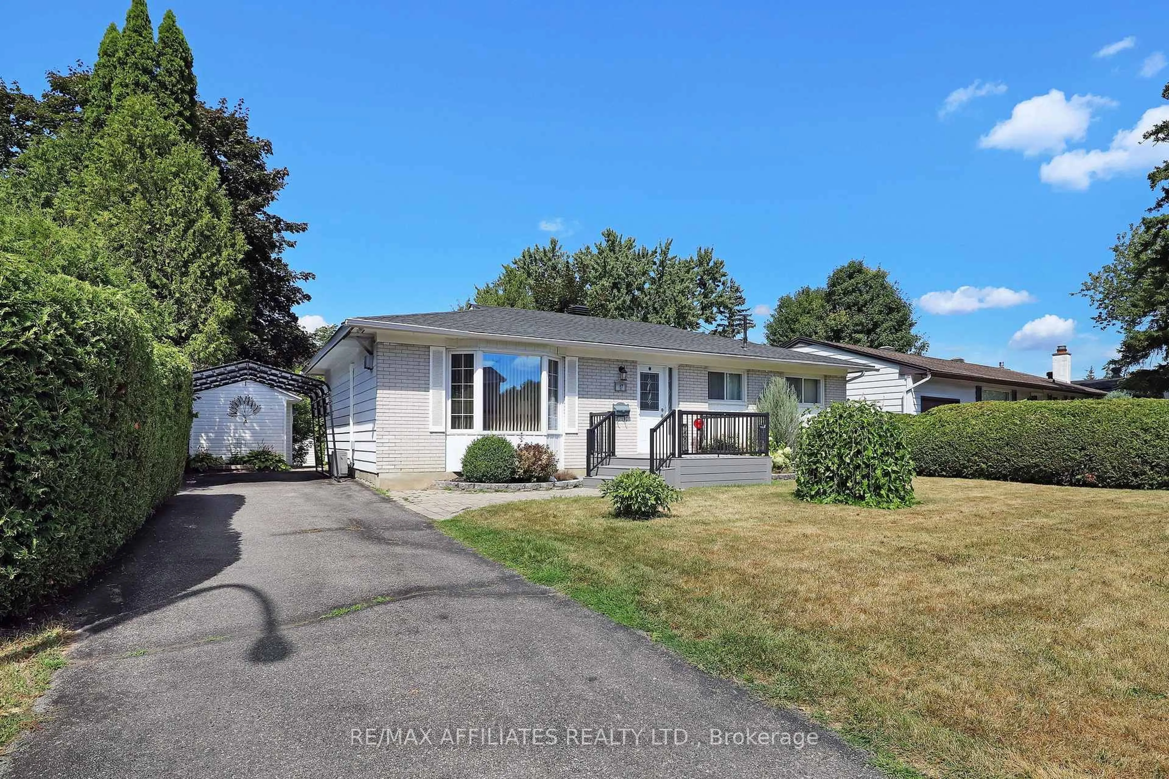 Home with vinyl exterior material, street for 17 Canfield Rd, Ottawa Ontario K2H 5S7