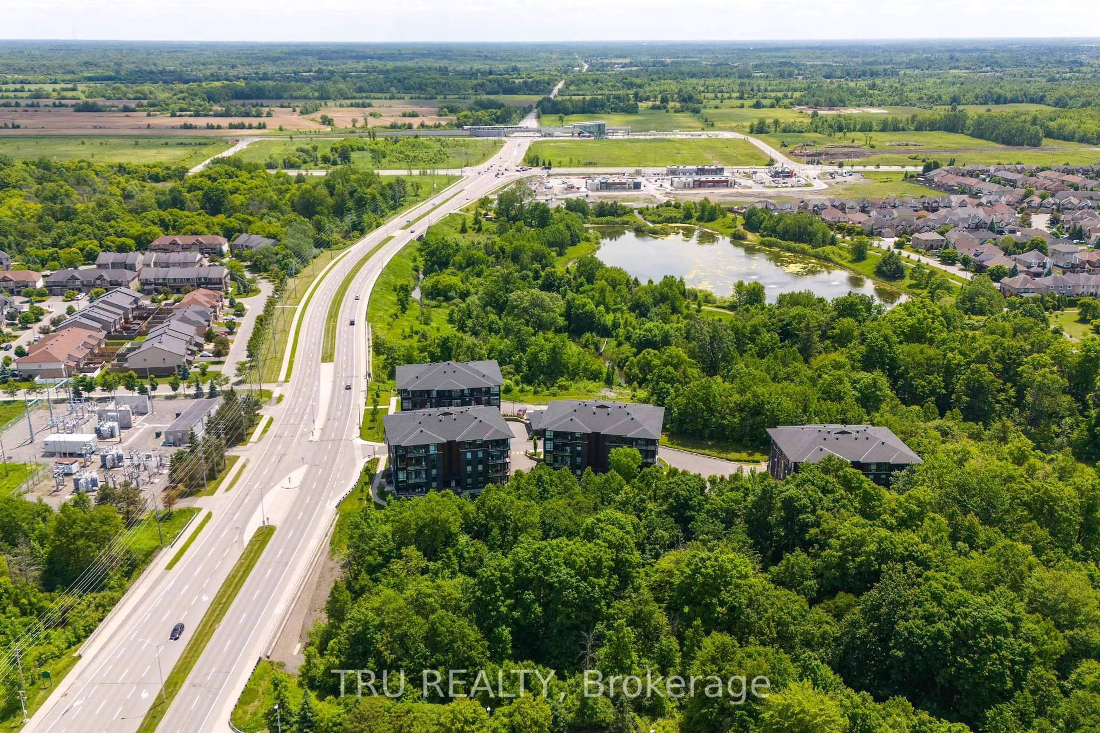 A pic from outside/outdoor area/front of a property/back of a property/a pic from drone, water/lake/river/ocean view for 100 CORTILE Private #102, Ottawa Ontario K1V 2S8