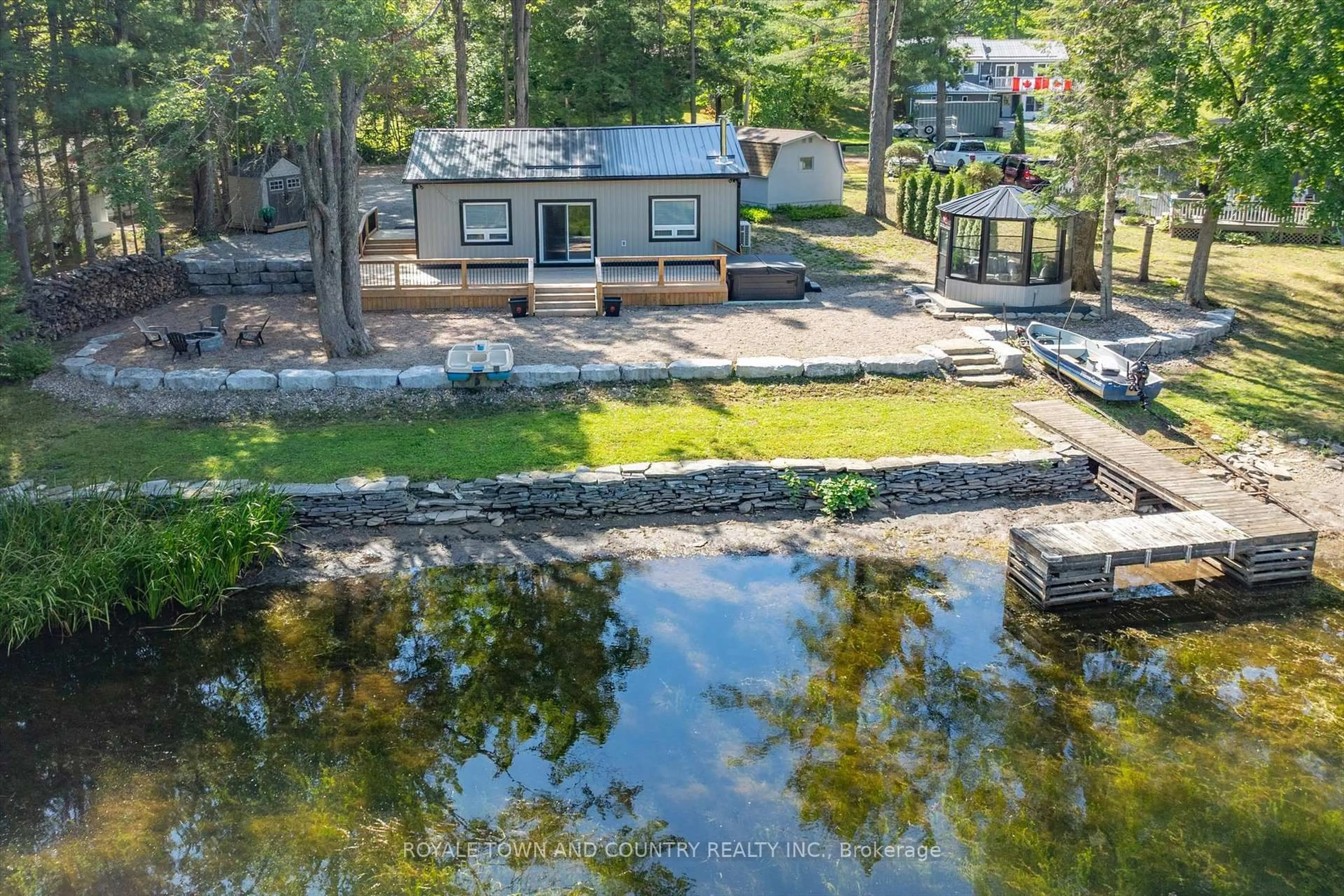 A pic from outside/outdoor area/front of a property/back of a property/a pic from drone, water/lake/river/ocean view for 11 Little Bay Dr, Kawartha Lakes Ontario K0M 2L0