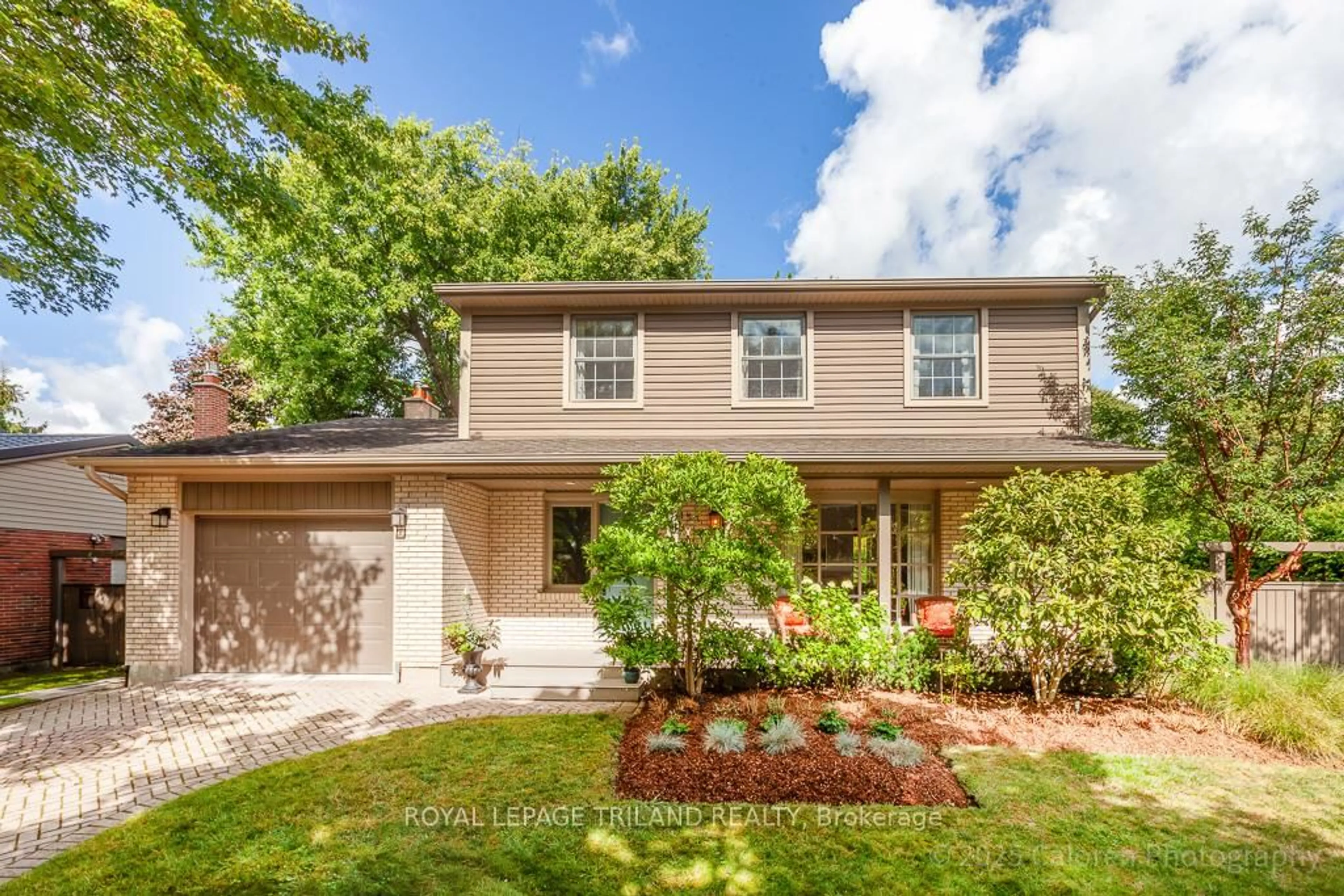 Home with brick exterior material, street for 1153 Prince Philip Dr, London North Ontario N6H 4E9