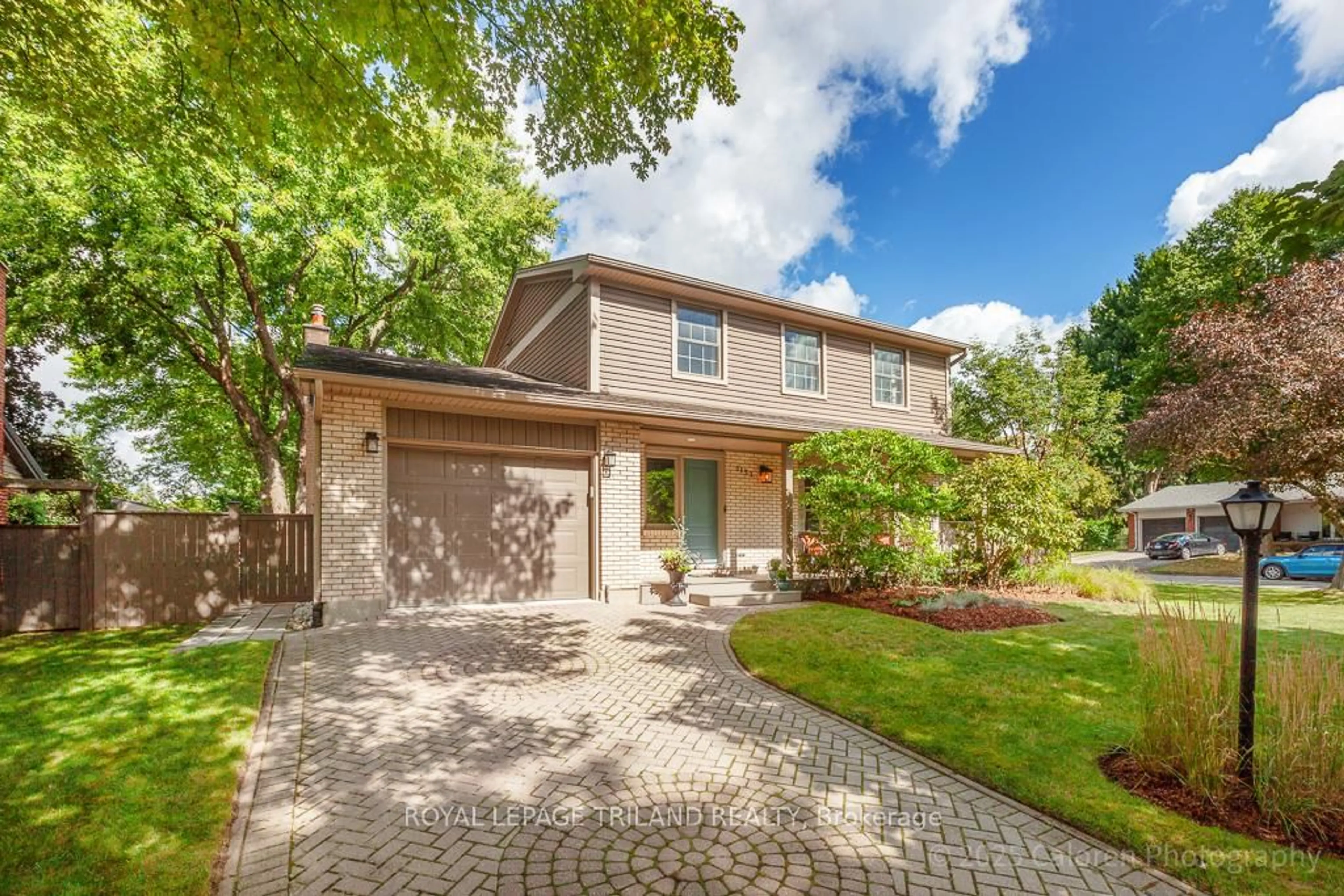 Home with brick exterior material, street for 1153 Prince Philip Dr, London North Ontario N6H 4E9