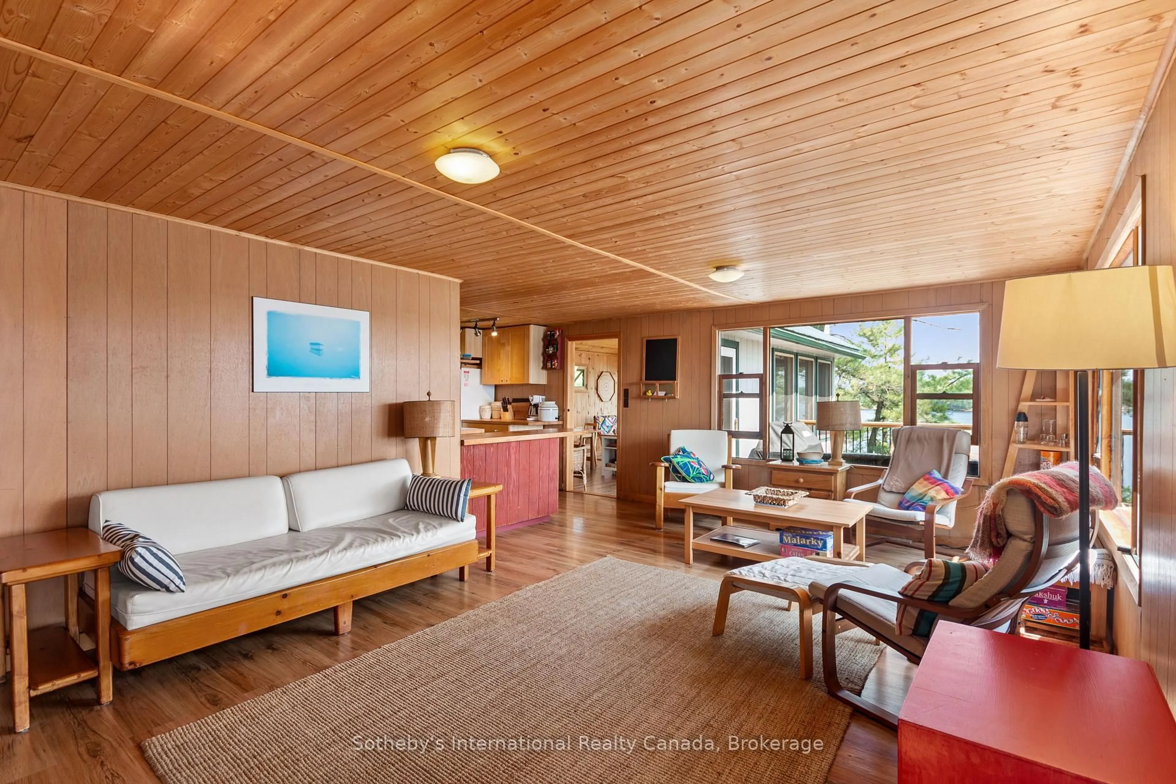 Living room with furniture, wood/laminate floor for 552 Is 80 Go Home Lake, Georgian Bay Ontario P0C 1H0