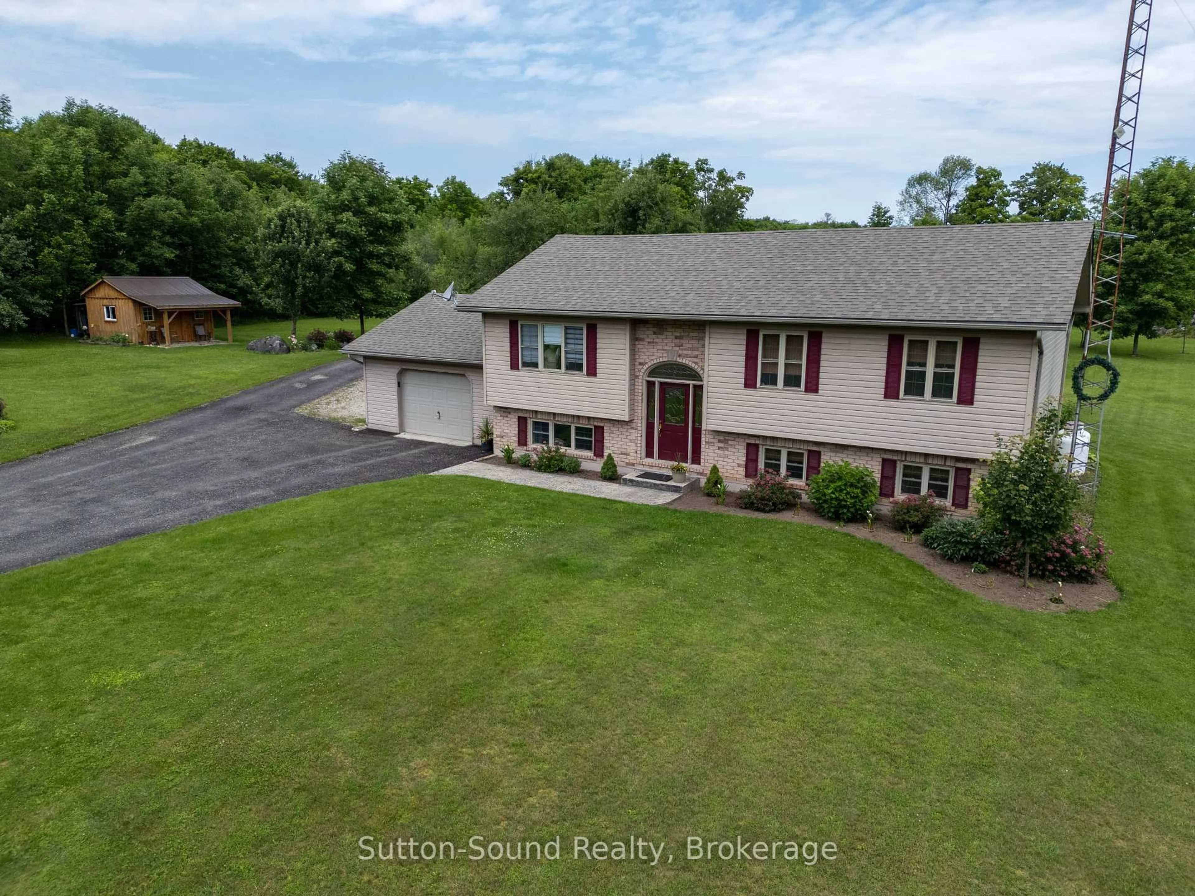 A pic from outside/outdoor area/front of a property/back of a property/a pic from drone, street for 442513 Concession 22 Concession, Georgian Bluffs Ontario N0H 2T0