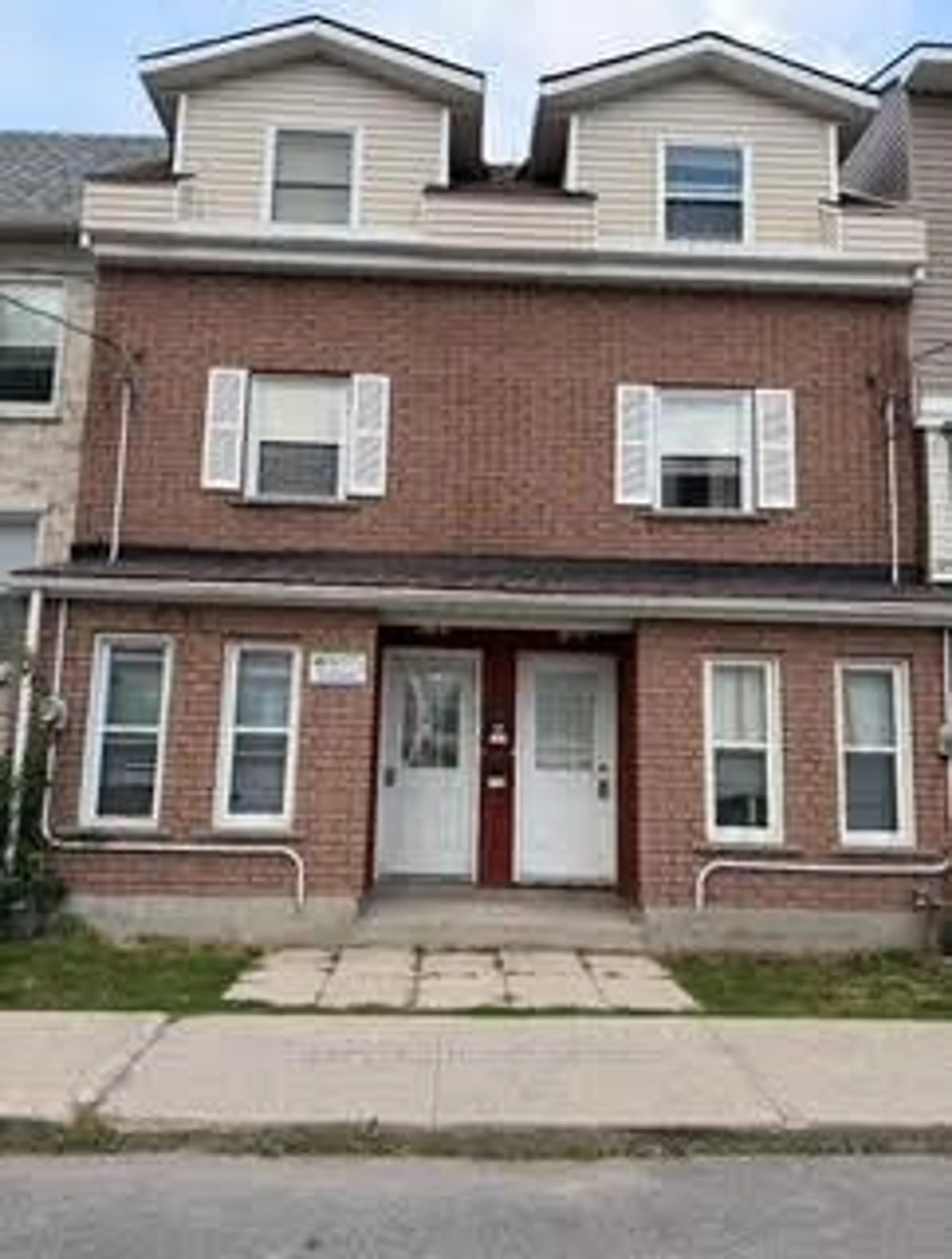 Home with brick exterior material, street for 221 Earl St, Kingston Ontario K7L 2H6
