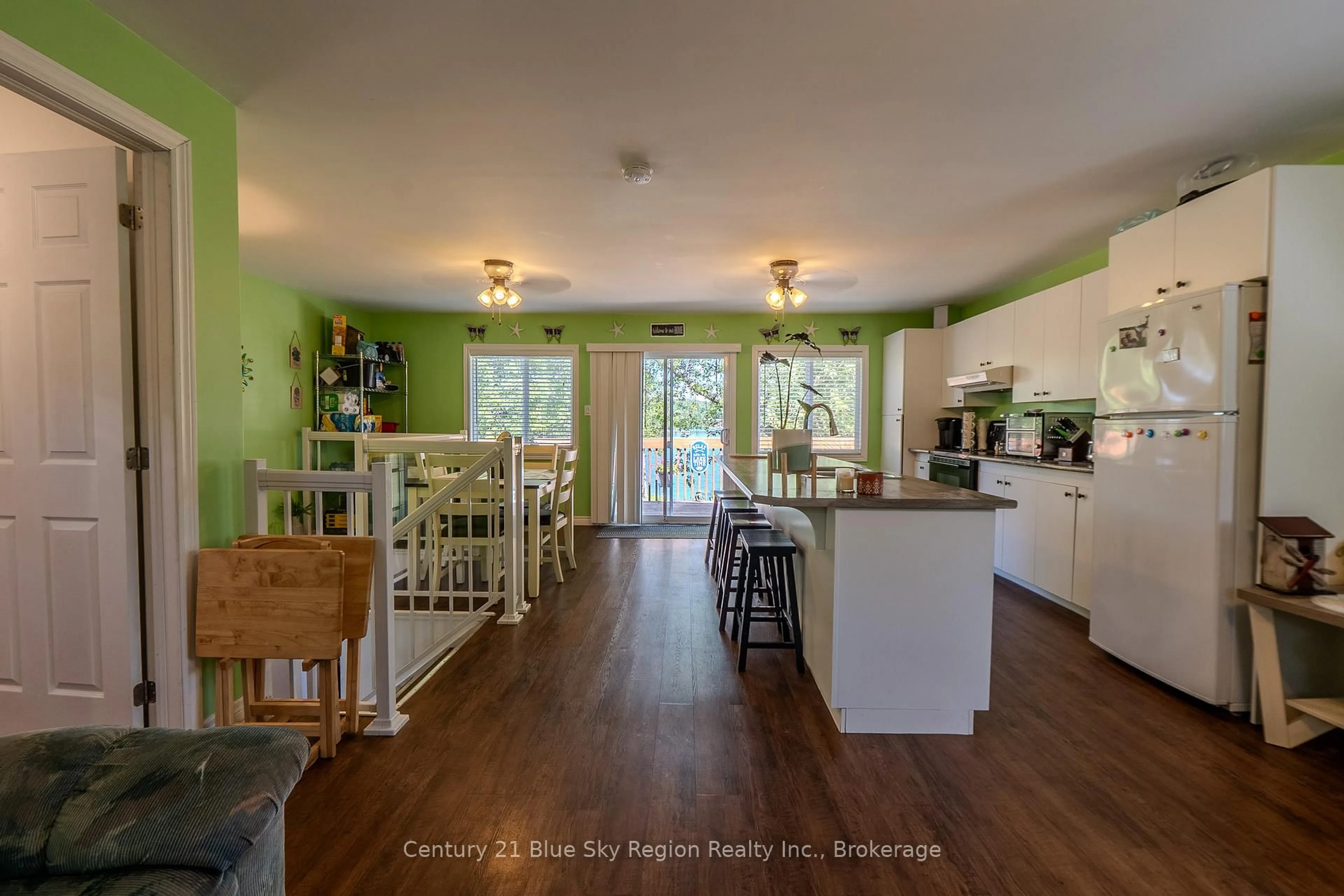 Open concept kitchen, wood/laminate floor for 58 Marina Rd, East Ferris Ontario P0H 1B0