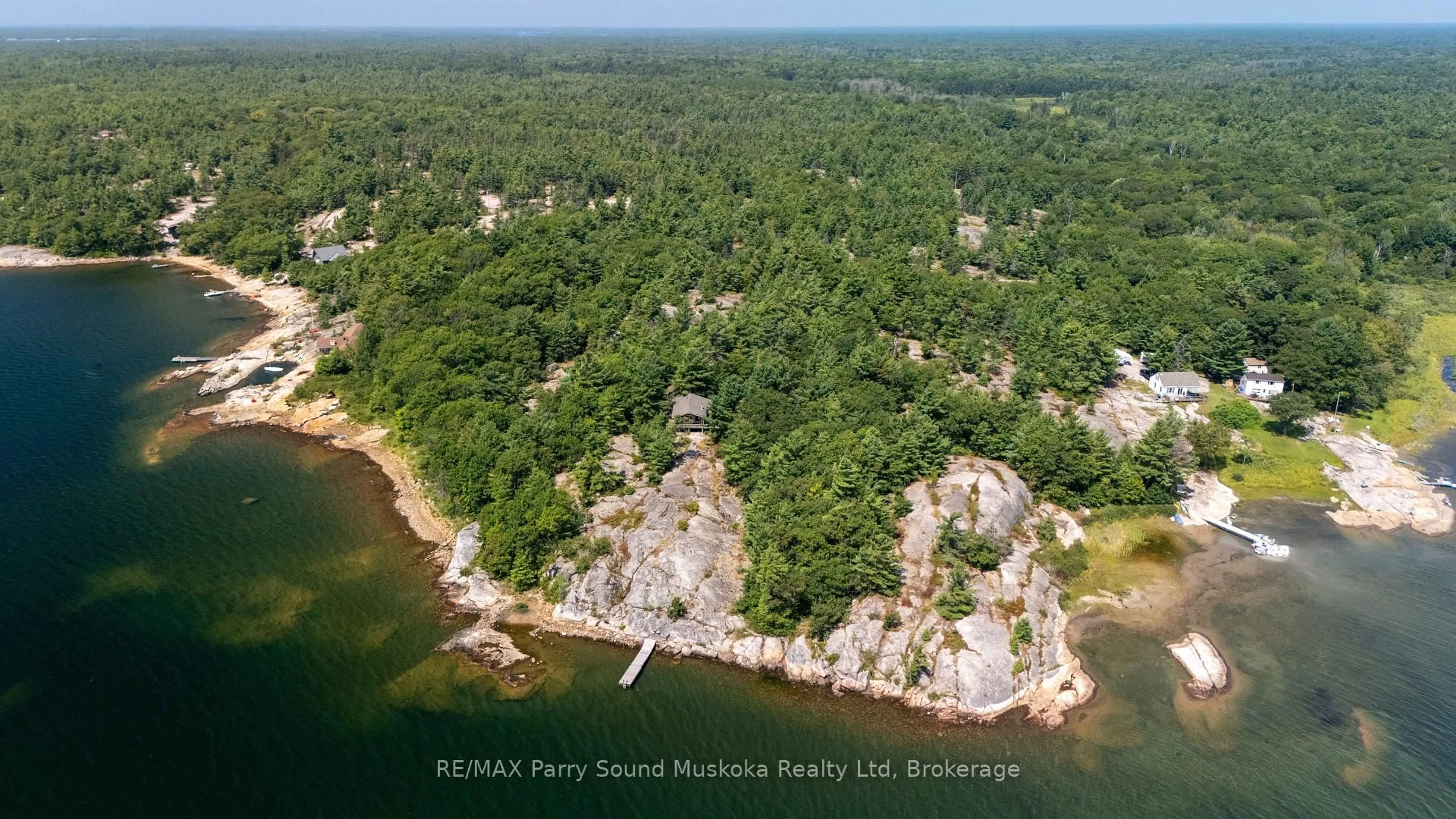 A pic from outside/outdoor area/front of a property/back of a property/a pic from drone, water/lake/river/ocean view for 10 Richards Bay Rd, Carling Ontario P0G 1G0