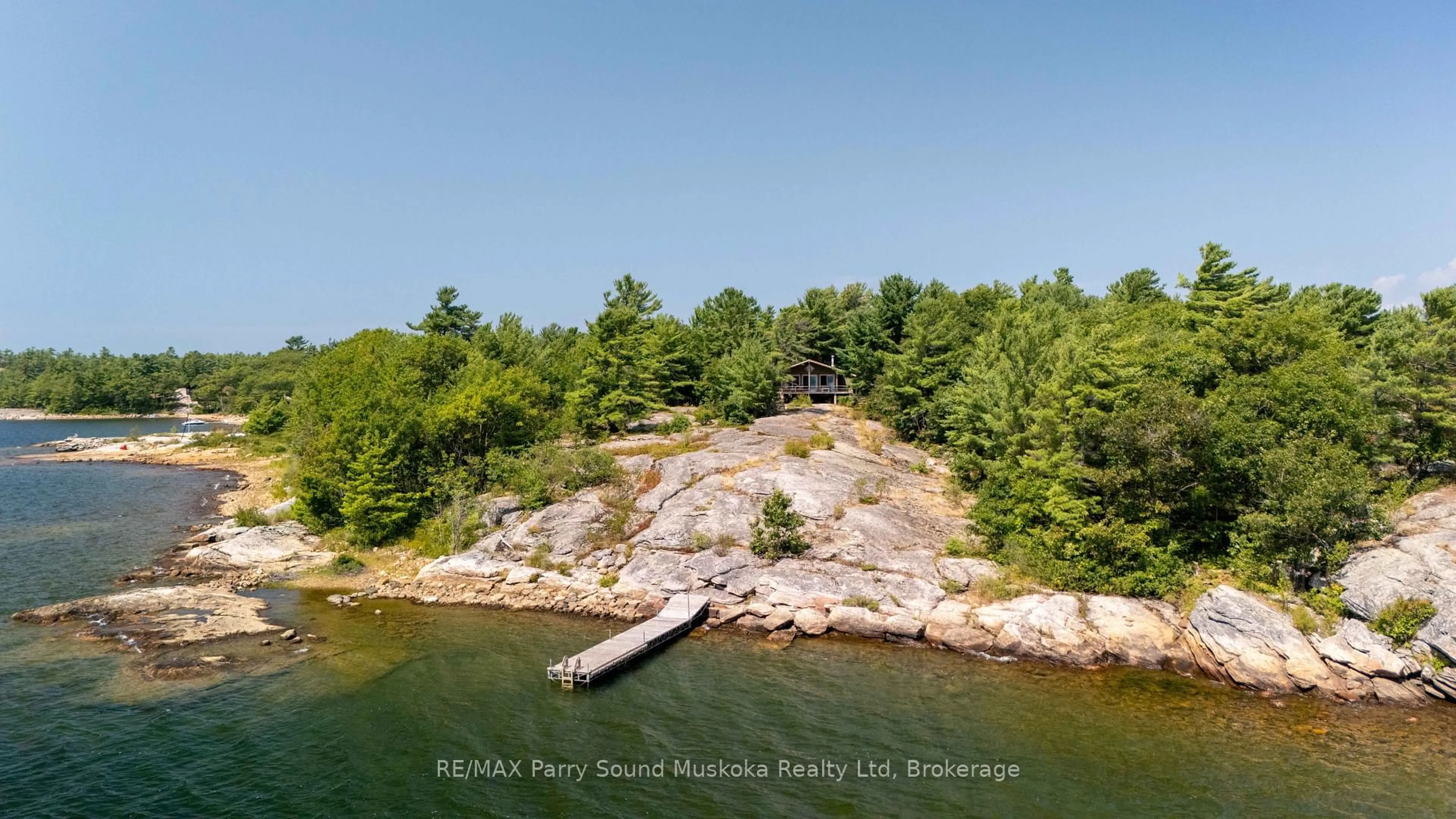 A pic from outside/outdoor area/front of a property/back of a property/a pic from drone, water/lake/river/ocean view for 10 Richards Bay Rd, Carling Ontario P0G 1G0