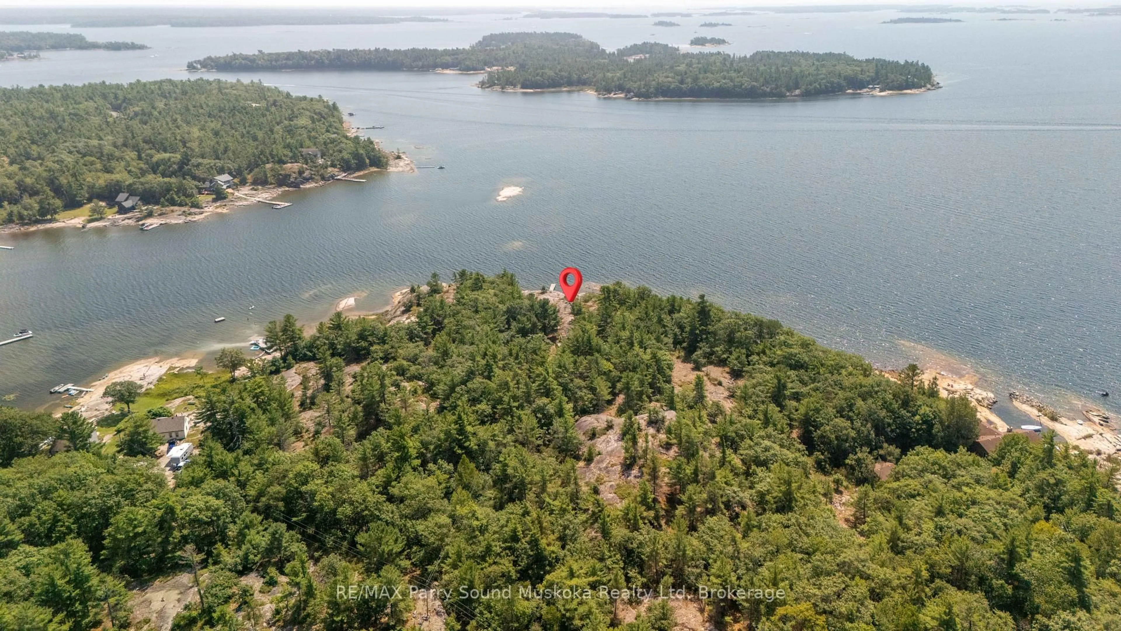 A pic from outside/outdoor area/front of a property/back of a property/a pic from drone, water/lake/river/ocean view for 10 Richards Bay Rd, Carling Ontario P0G 1G0