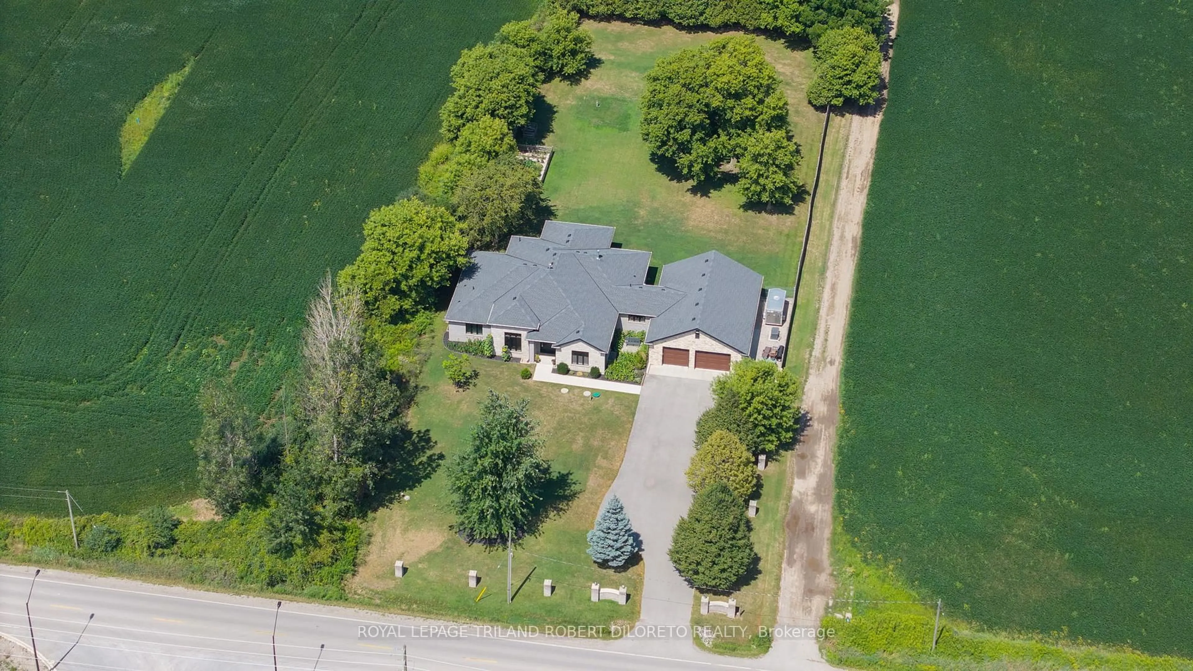 A pic from outside/outdoor area/front of a property/back of a property/a pic from drone, water/lake/river/ocean view for 1445 Sunningdale Rd, London North Ontario N6G 5B7