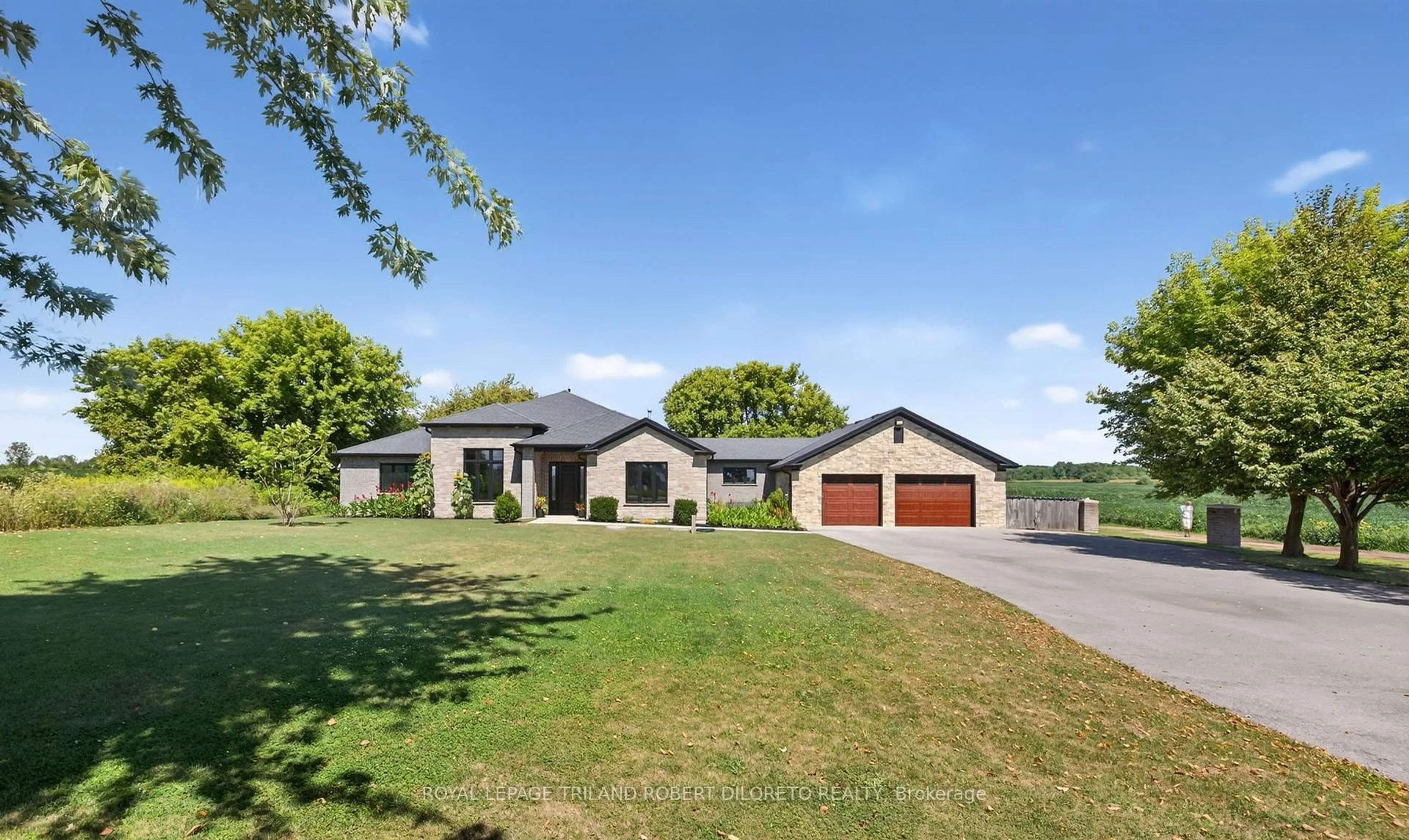 A pic from outside/outdoor area/front of a property/back of a property/a pic from drone, street for 1445 Sunningdale Rd, London North Ontario N6G 5B7